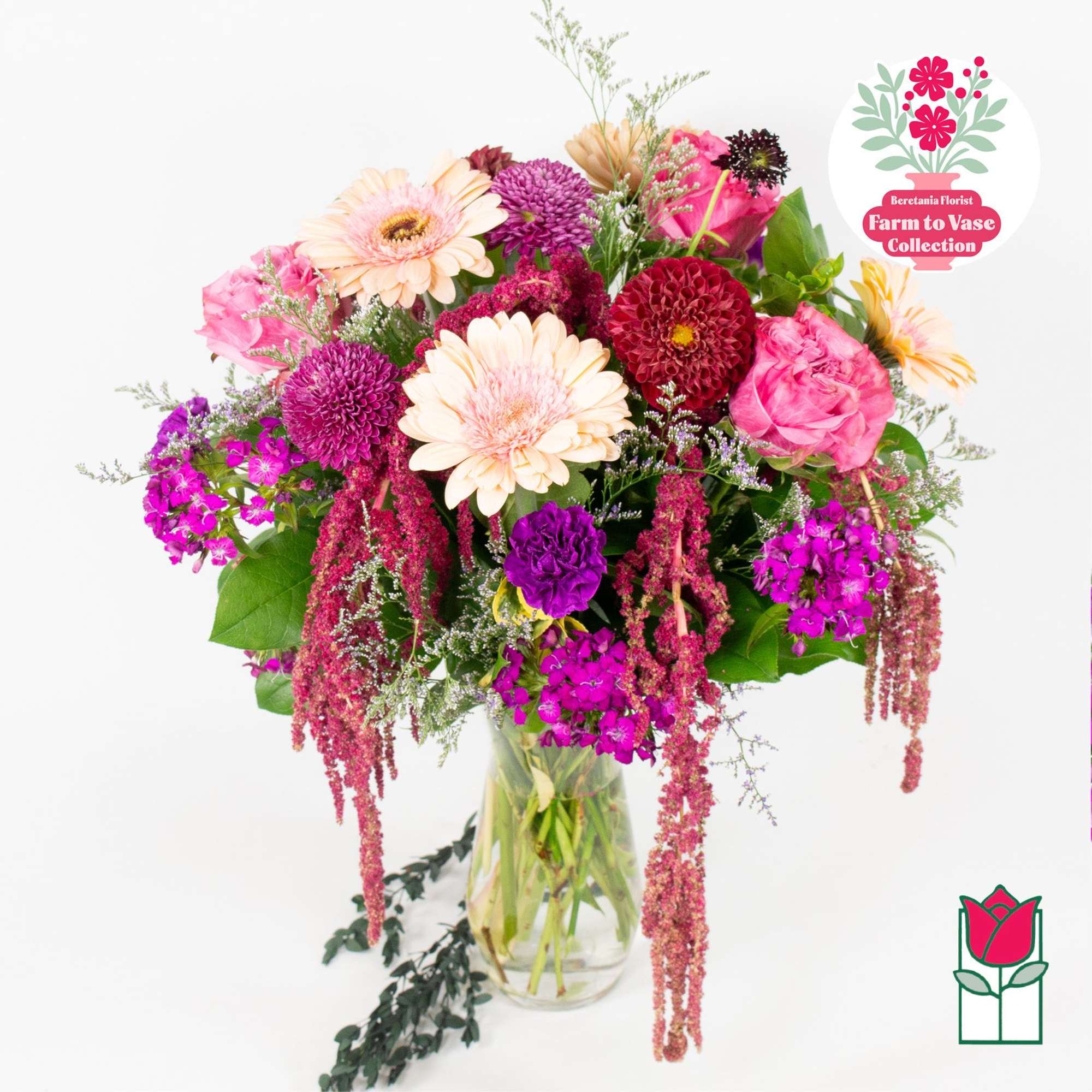 Mixed pink and purple bouquet in a clear glass vase, photo 2 of 7
