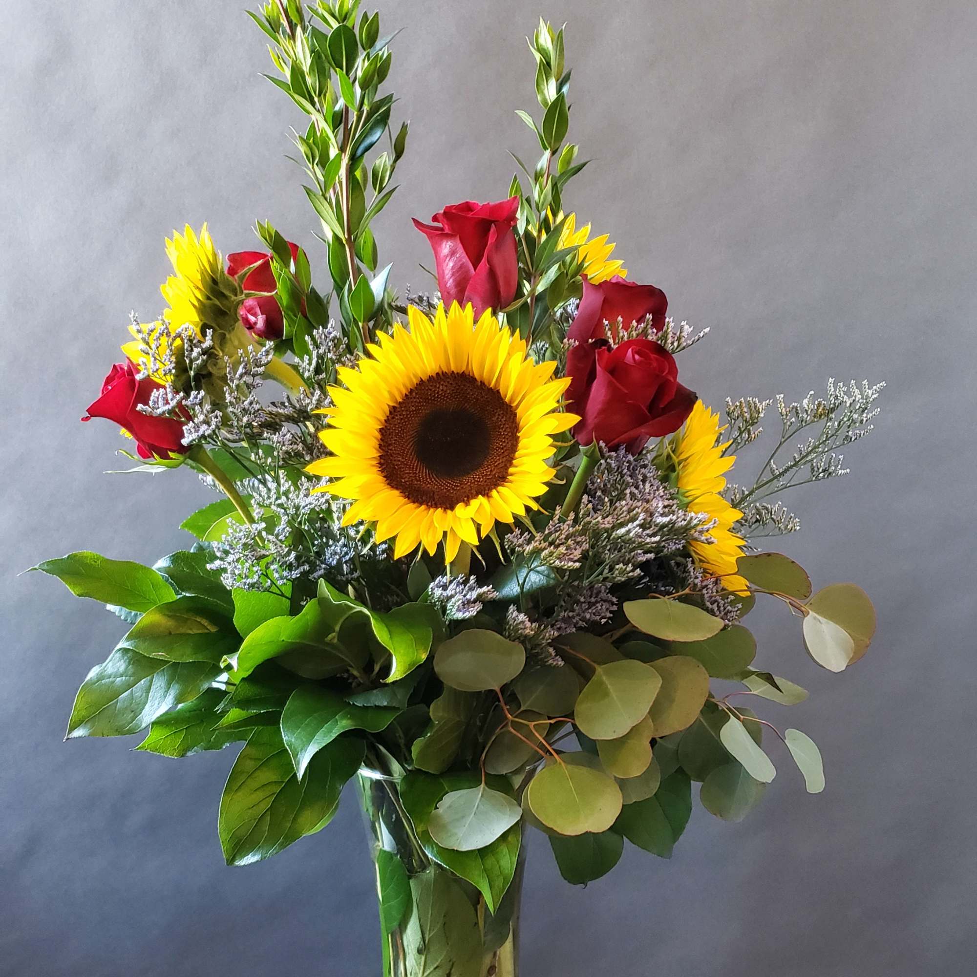 Pop of warmth in a glass vase to add sunshine to someone's, photo 2 of 2