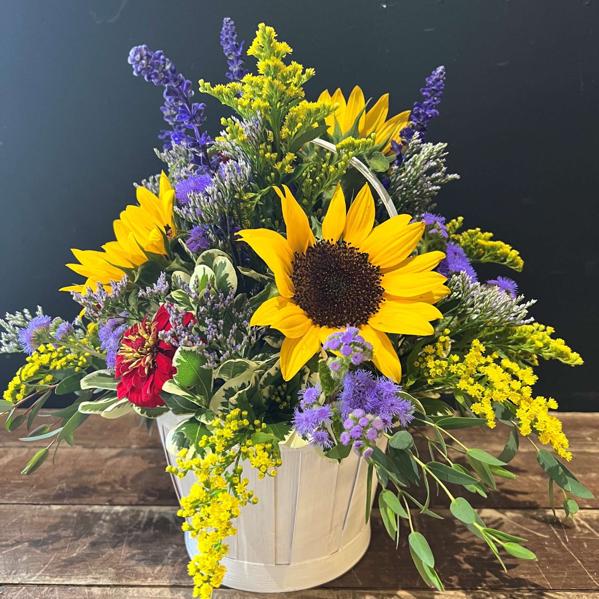 A delightful basket of farm fresh flowers. Including sunflowers, solidago, zinnias and, photo 2 of 2
