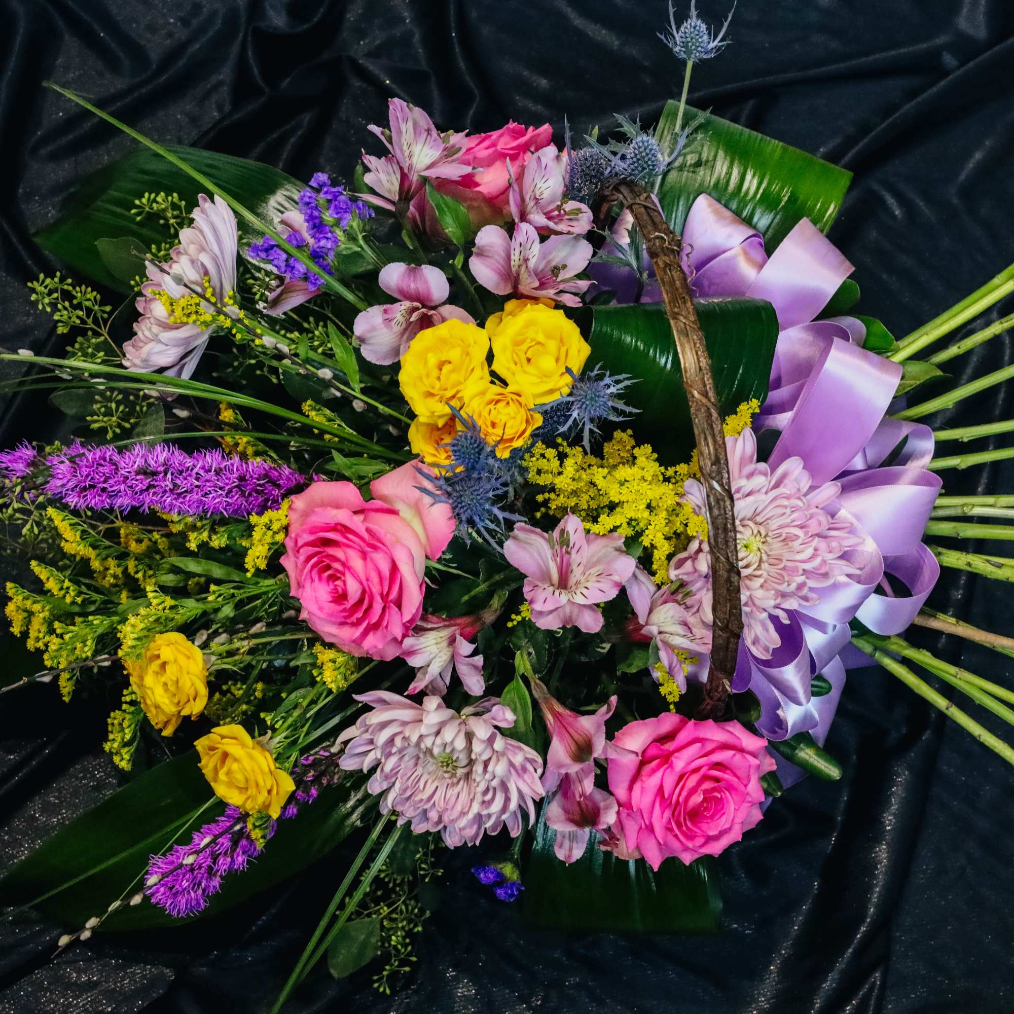 Gorgeous premium flowers filling a beautiful wicker basket designed to help a, photo 2 of 3