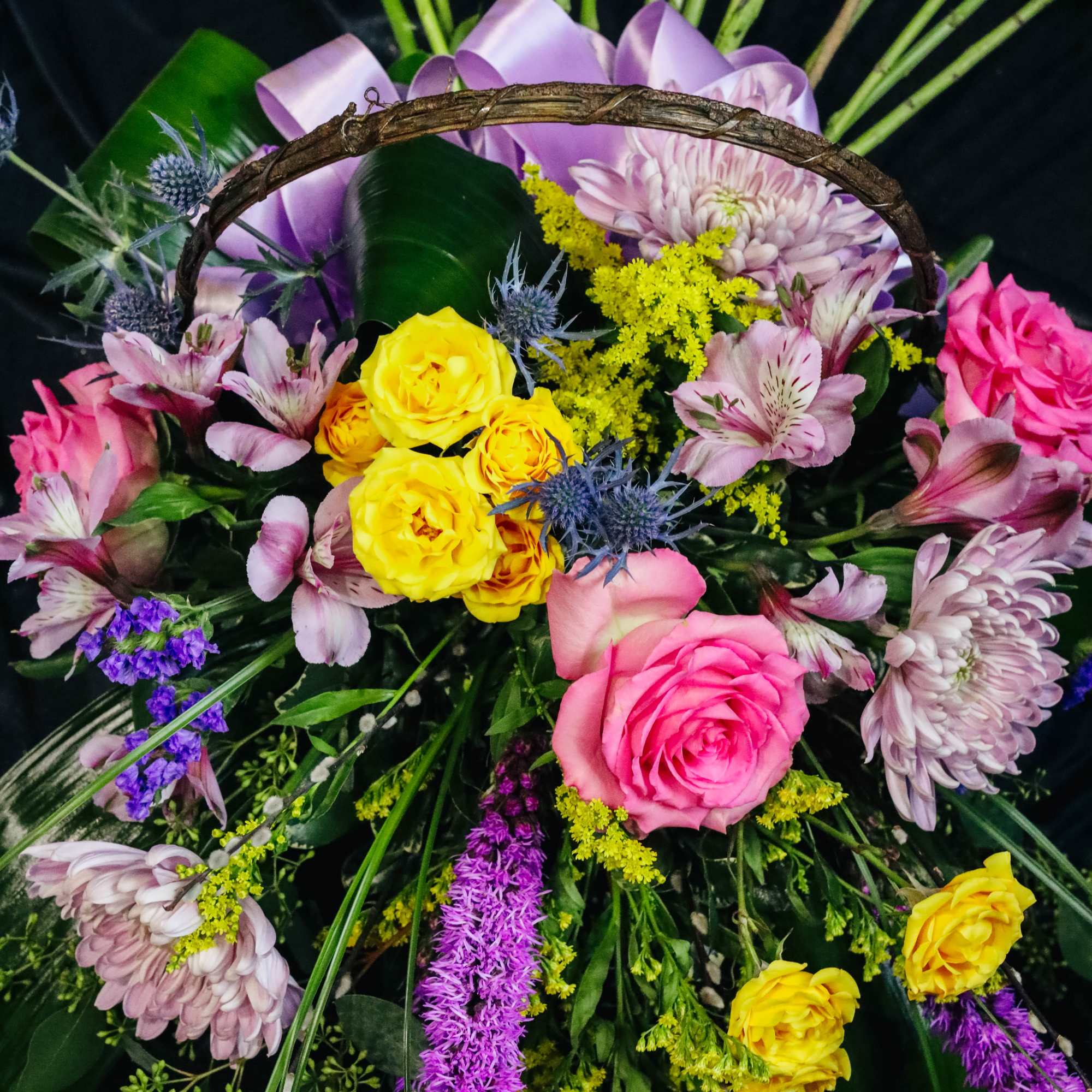Gorgeous premium flowers filling a beautiful wicker basket designed to help a, photo 3 of 3