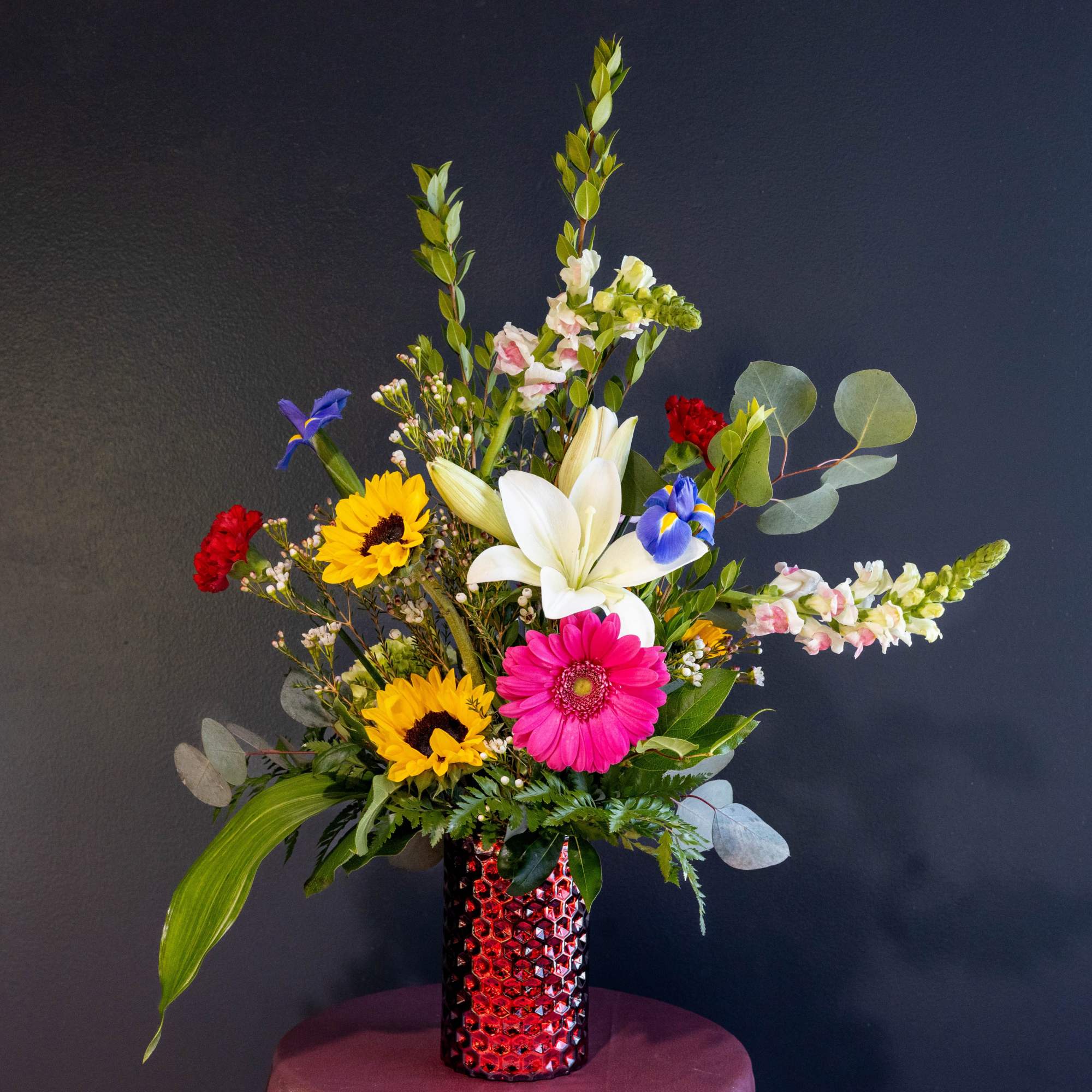 Vibrant Goddess is a tall arrangement with a vibrant variety of floral