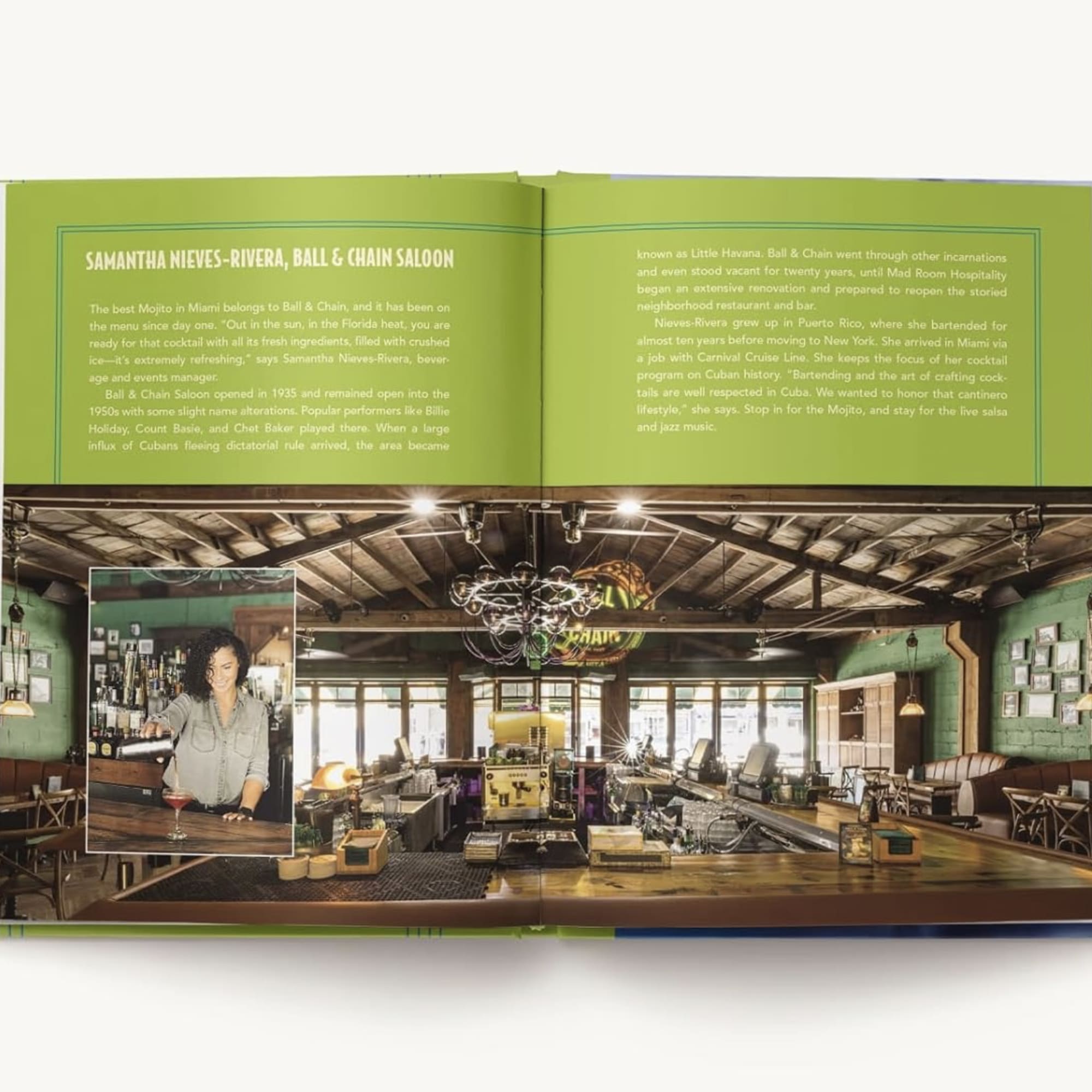 Open book showing a bar interior and text pages