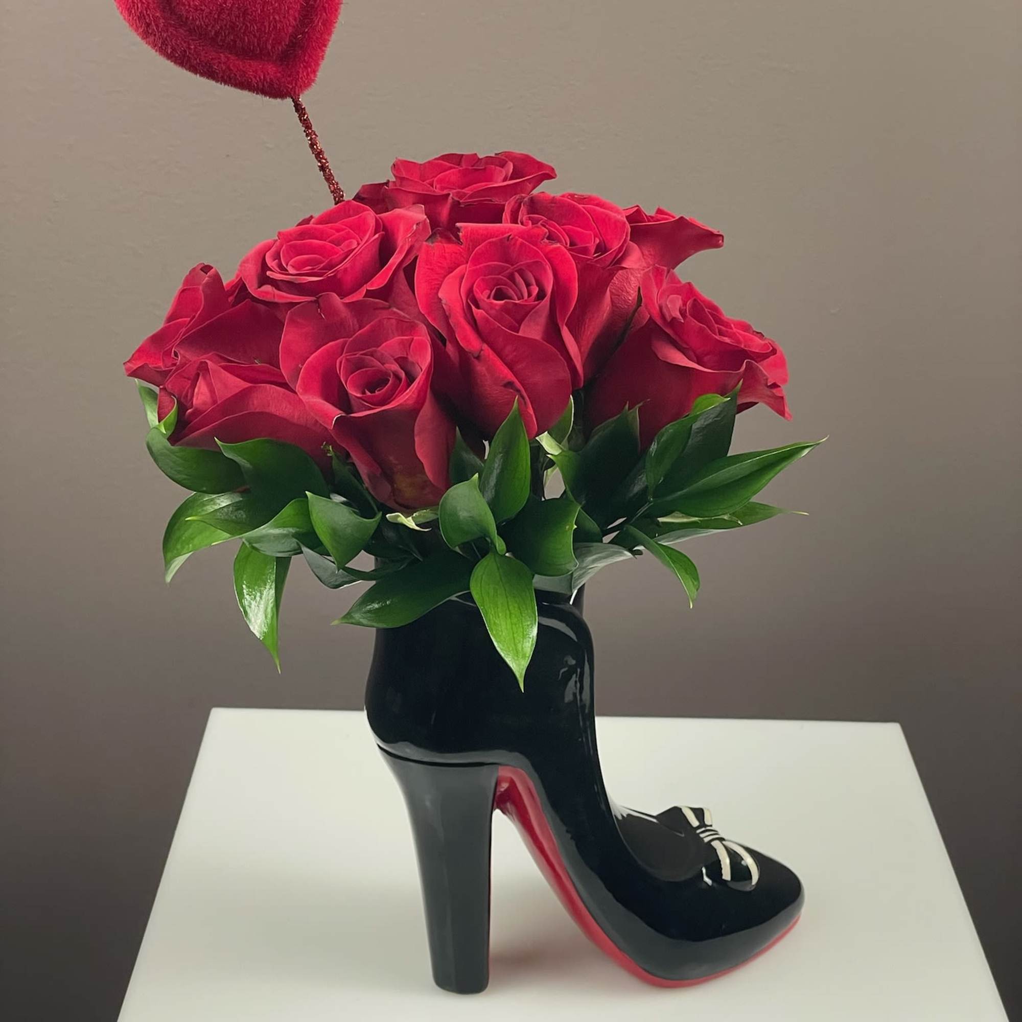 Step into style with our most requested floral arrangement! This chic, high-fashion