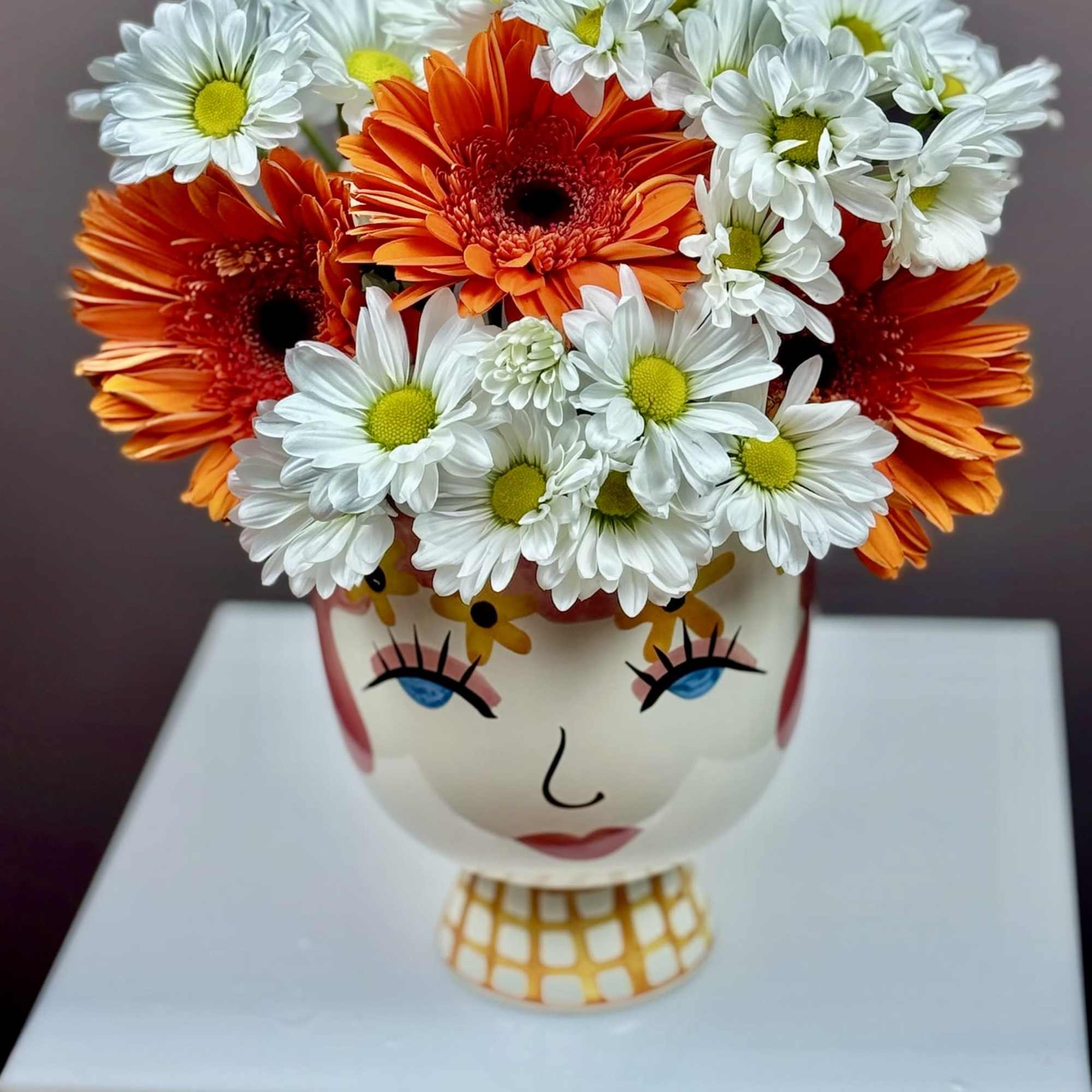 This cheerful arrangement is designed to bring a playful burst of personality, photo 2 of 3