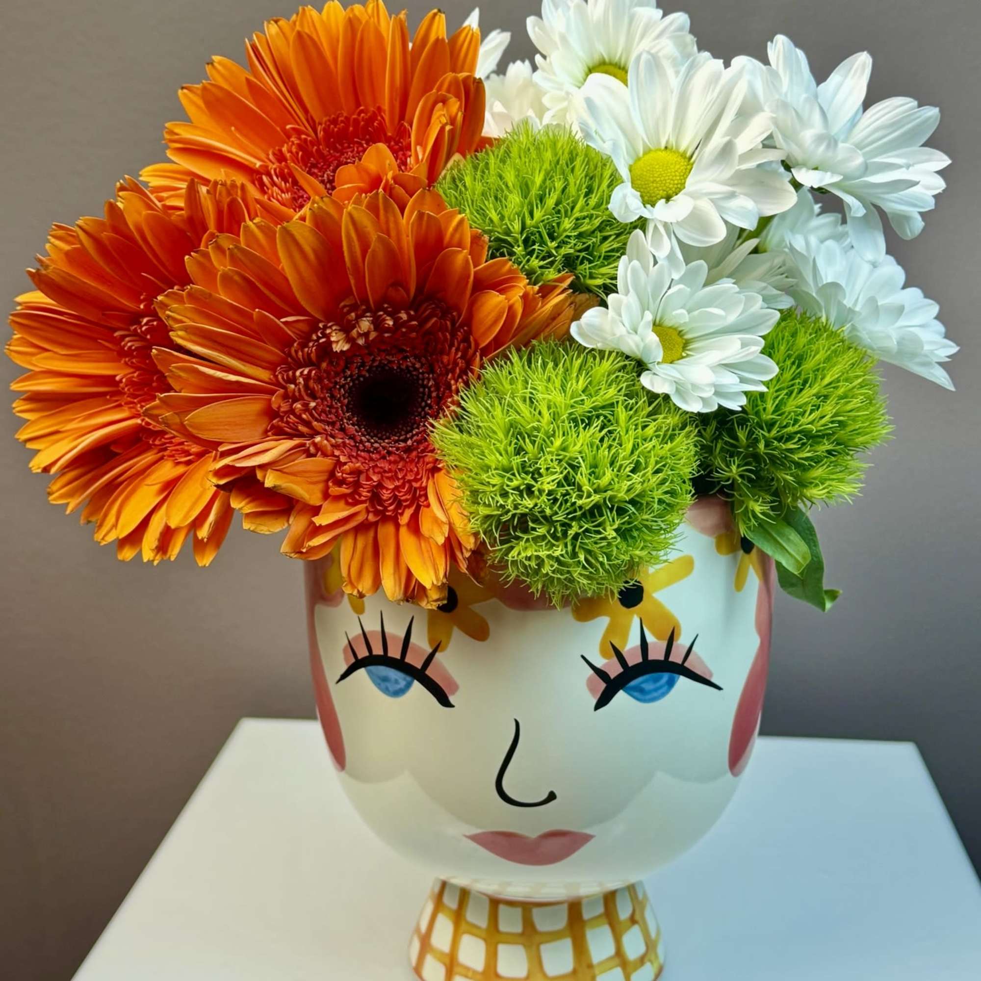 This cheerful arrangement is designed to bring a playful burst of personality, photo 2 of 3