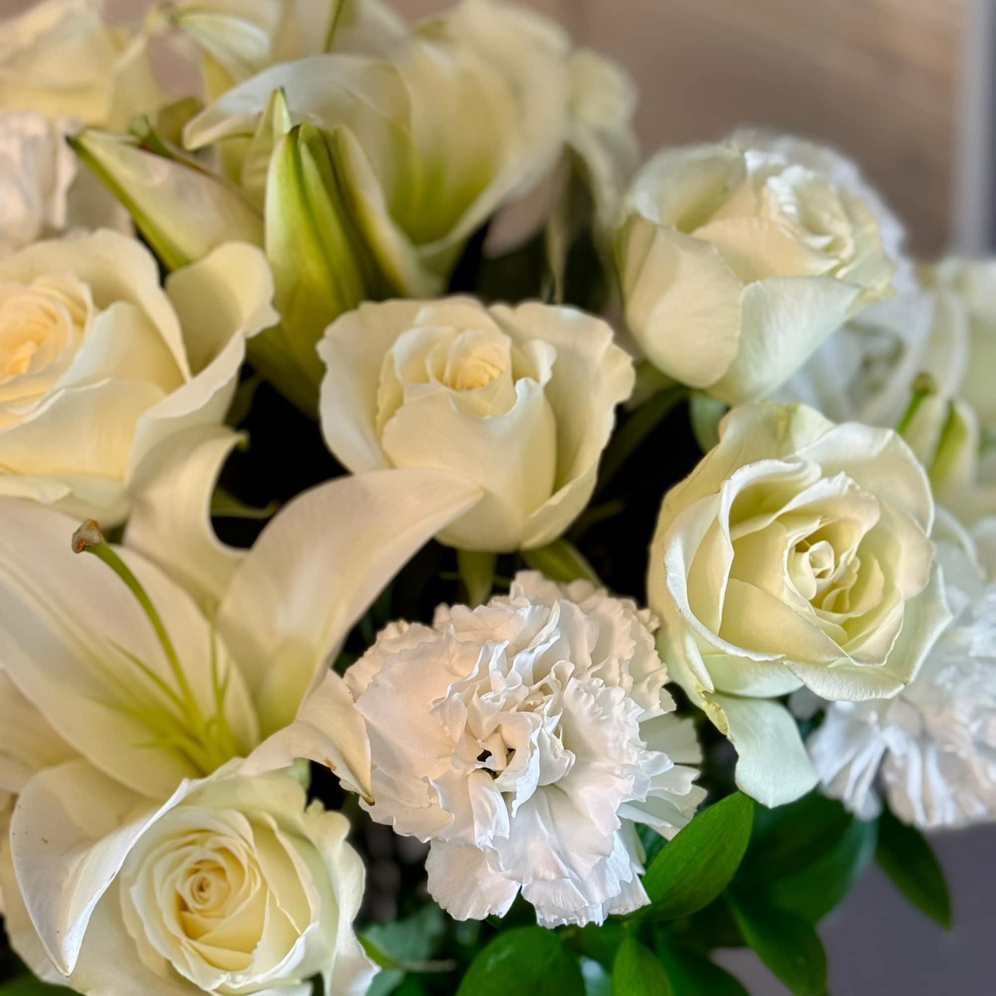This timeless floral arrangement features a luxurious blend of pure white roses, photo 2 of 4