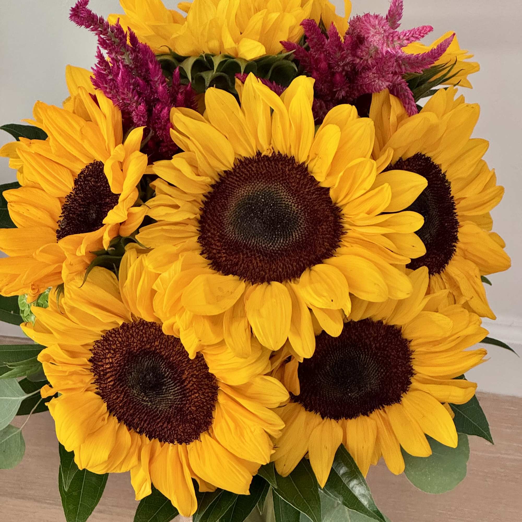 A radiant display of sunflowers designed to brighten any space. This arrangement, photo 2 of 4