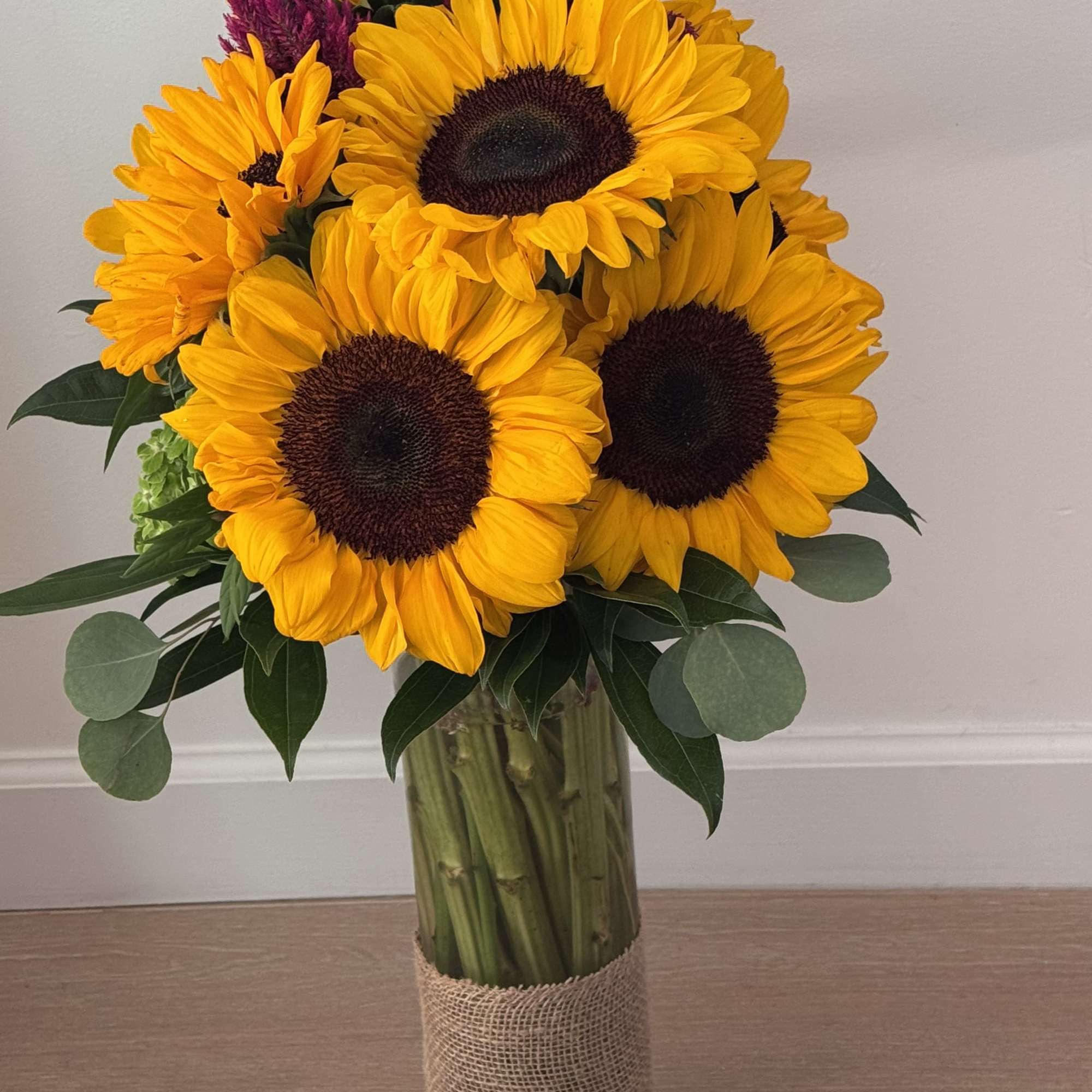 A radiant display of sunflowers designed to brighten any space. This arrangement, photo 3 of 4