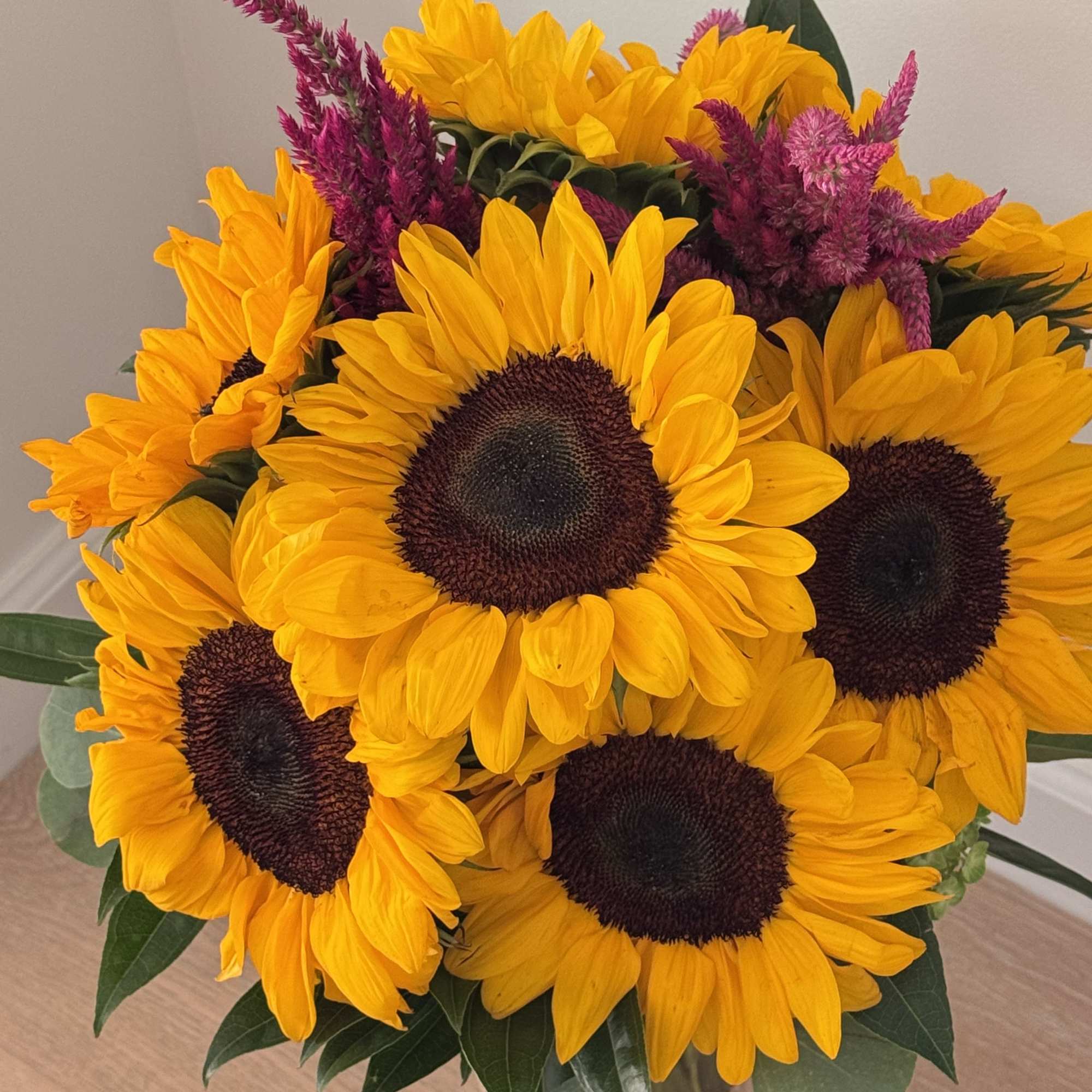 A radiant display of sunflowers designed to brighten any space. This arrangement, photo 4 of 4