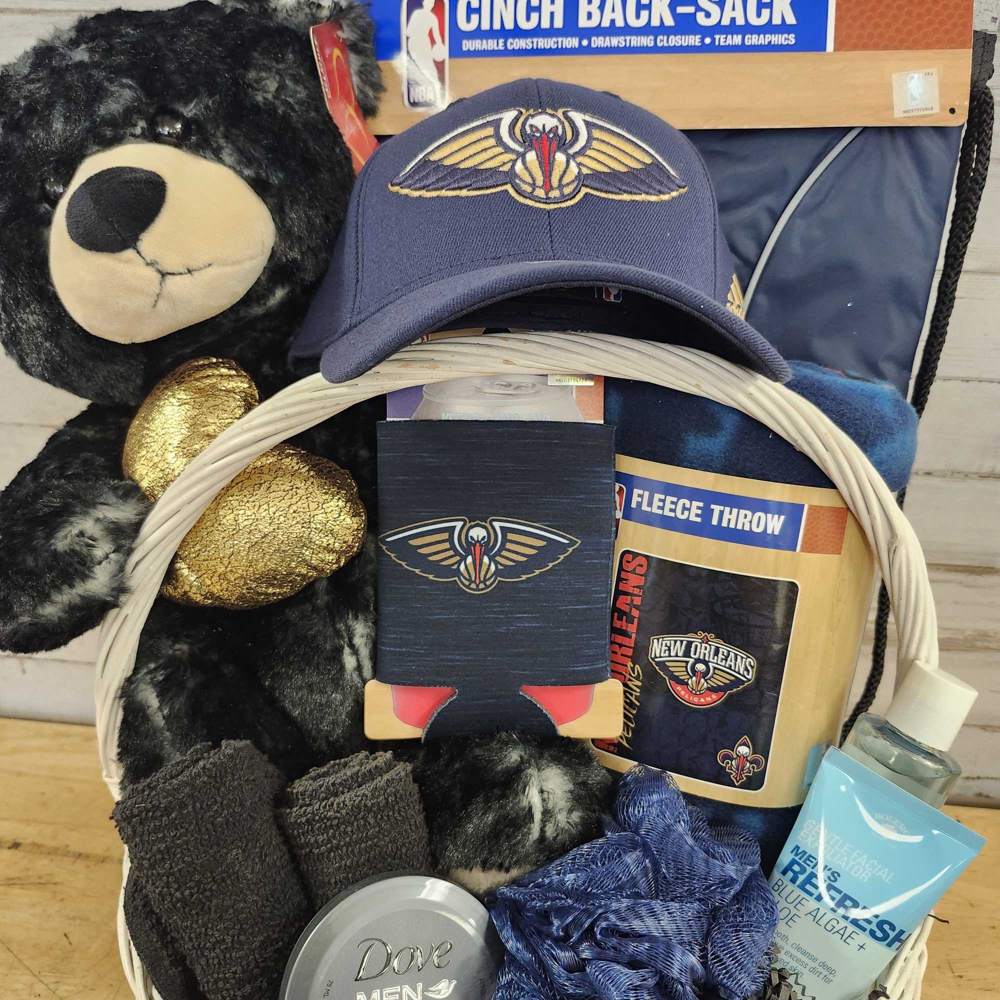 Gift basket with a teddy bear, sports items, and grooming products, photo 2 of 2