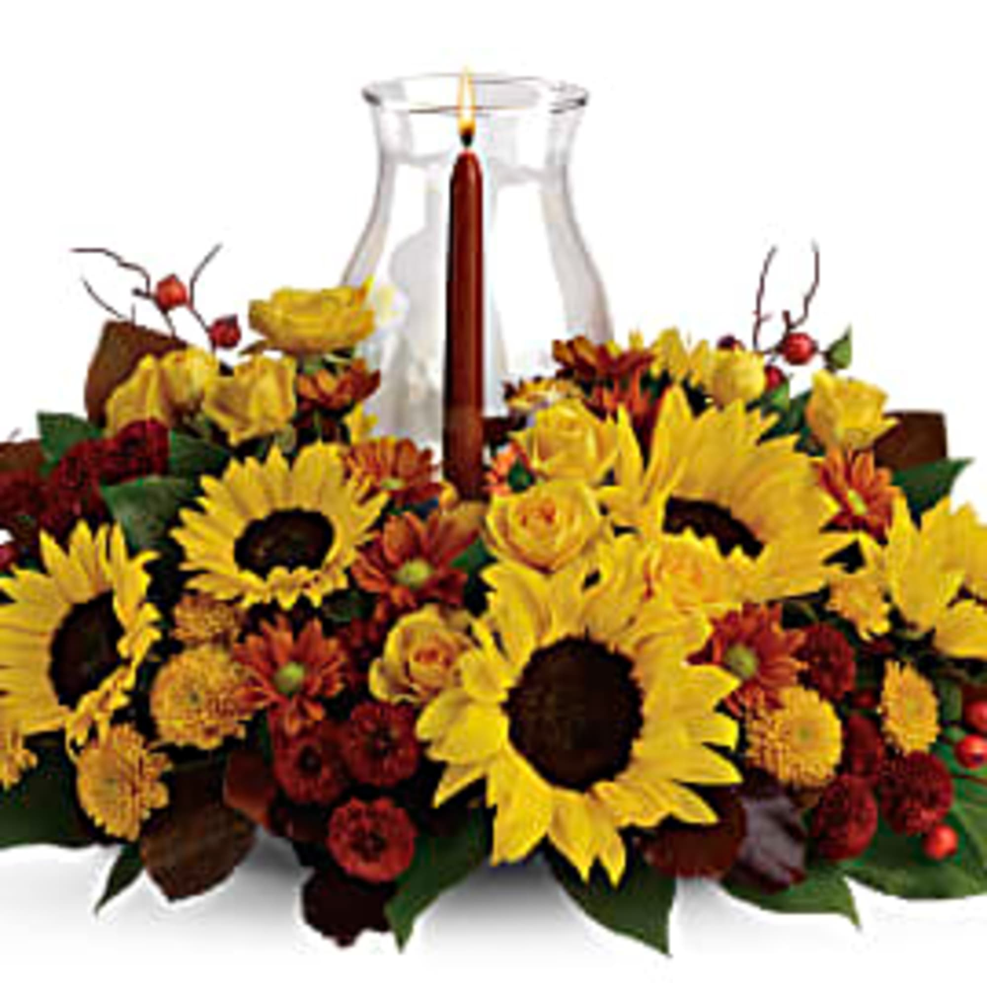 Sunflower and autumn flower centerpiece with a candle in a glass vase
