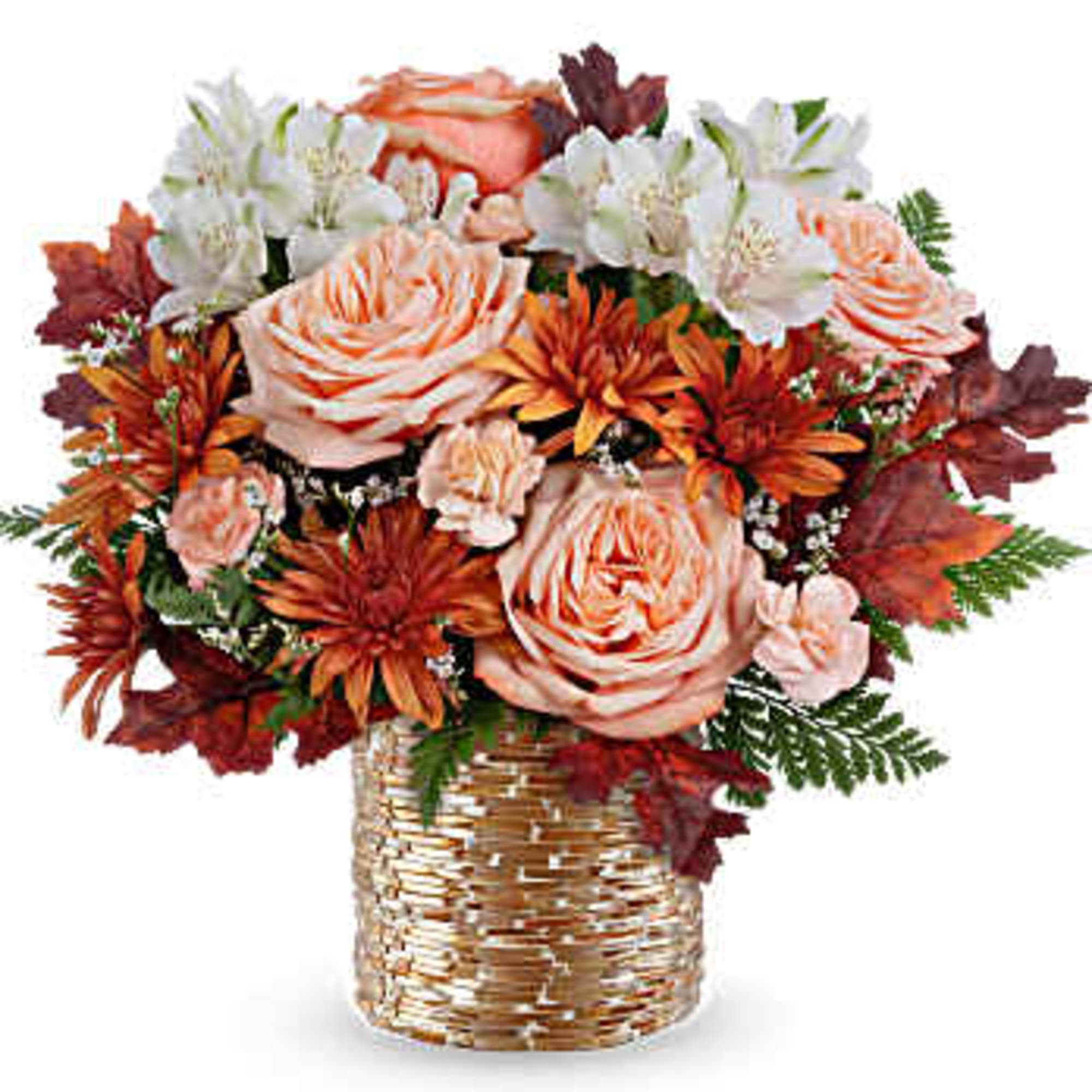 Peach roses and white flowers in a woven basket arrangement