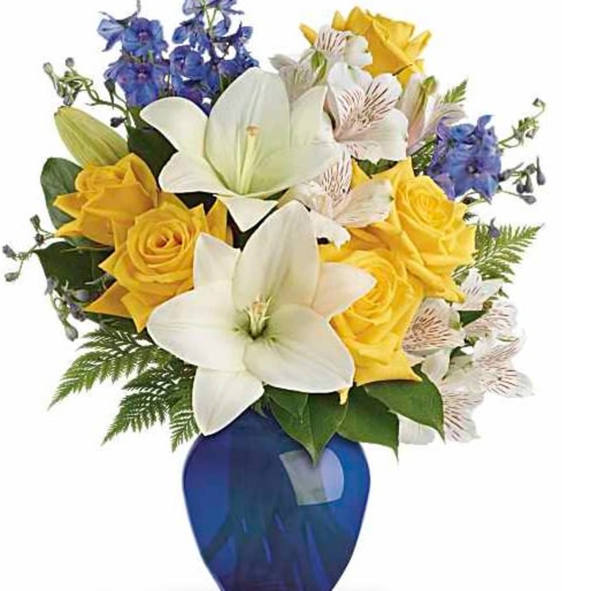 Bouquet of yellow roses, white lilies, and blue flowers in a blue vase