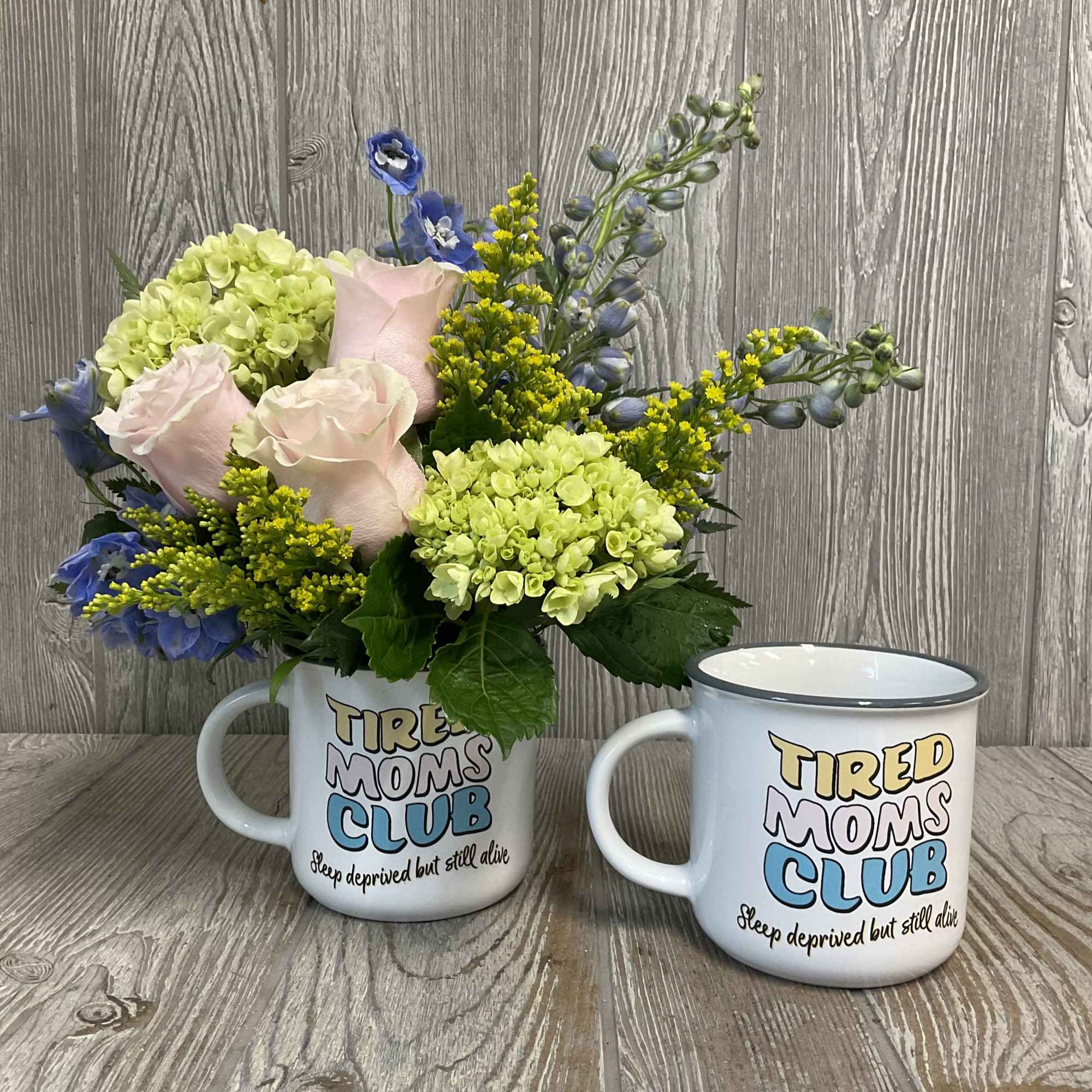 A soft floral arrangement in a relatable keepsake mug. Makes a great, photo 4 of 4