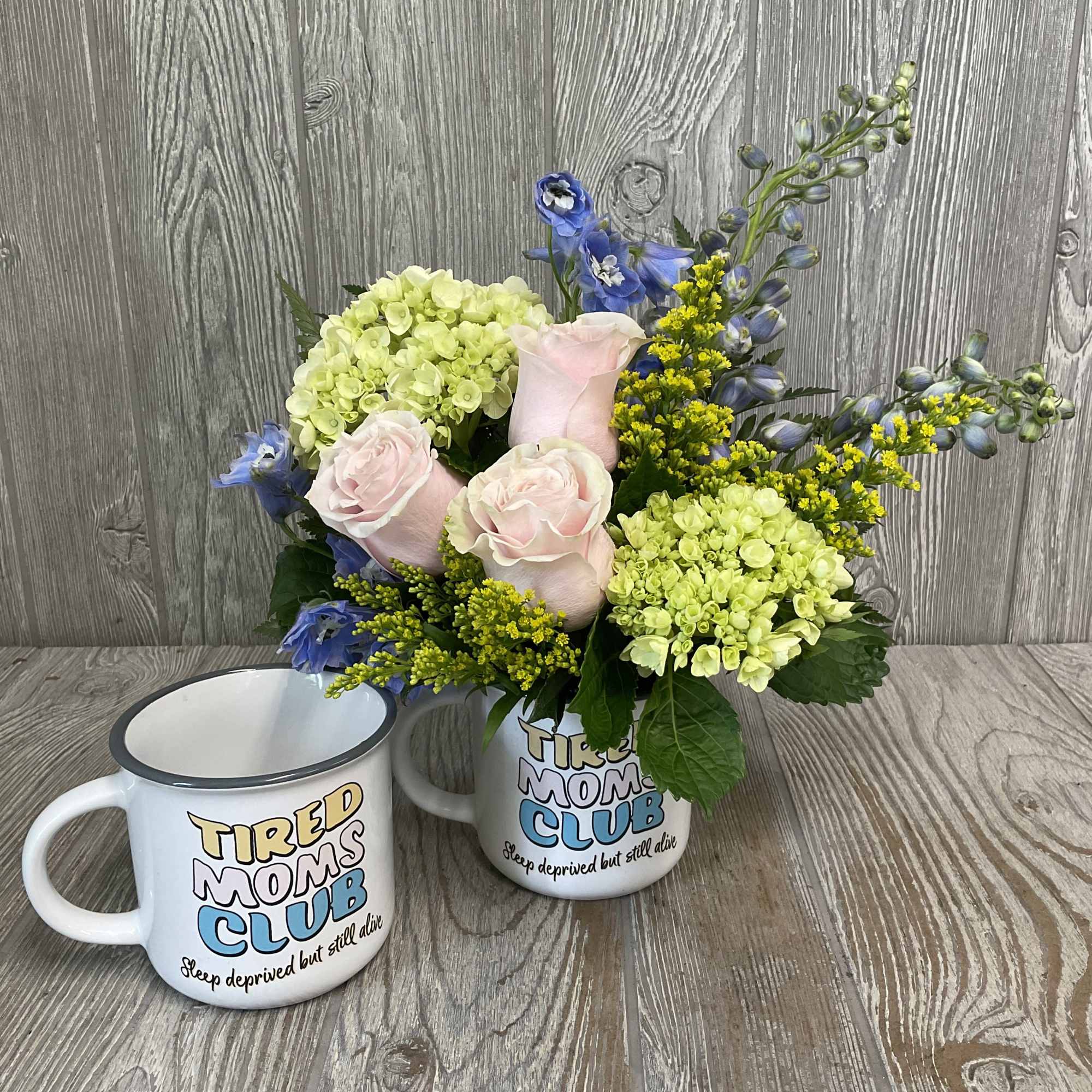 A soft floral arrangement in a relatable keepsake mug. Makes a great, photo 3 of 4