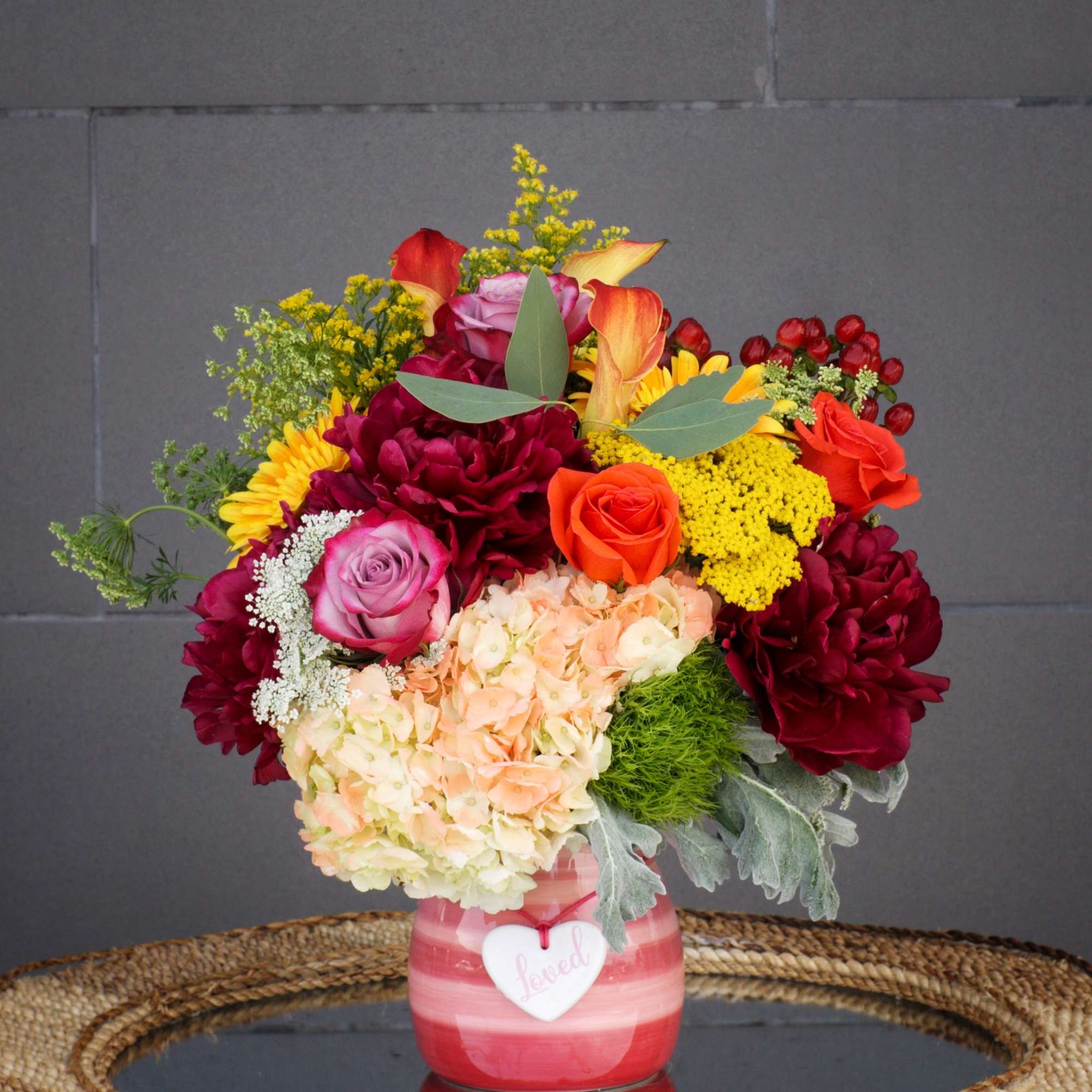 Colorful design including all premium fresh flowers: rose, orchid, lily... in a, photo 2 of 3
