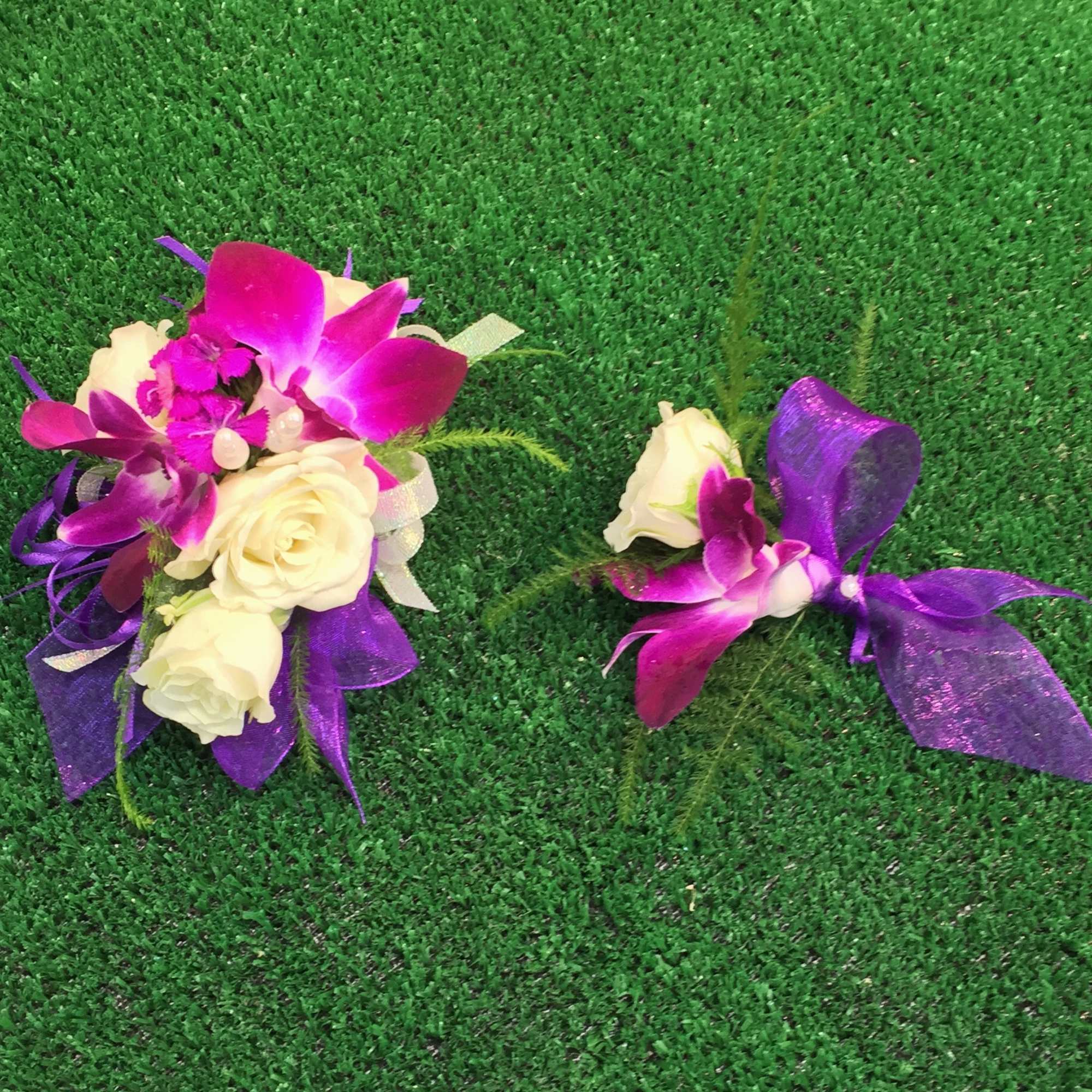 Purple orchid and white rose corsage with ribbon