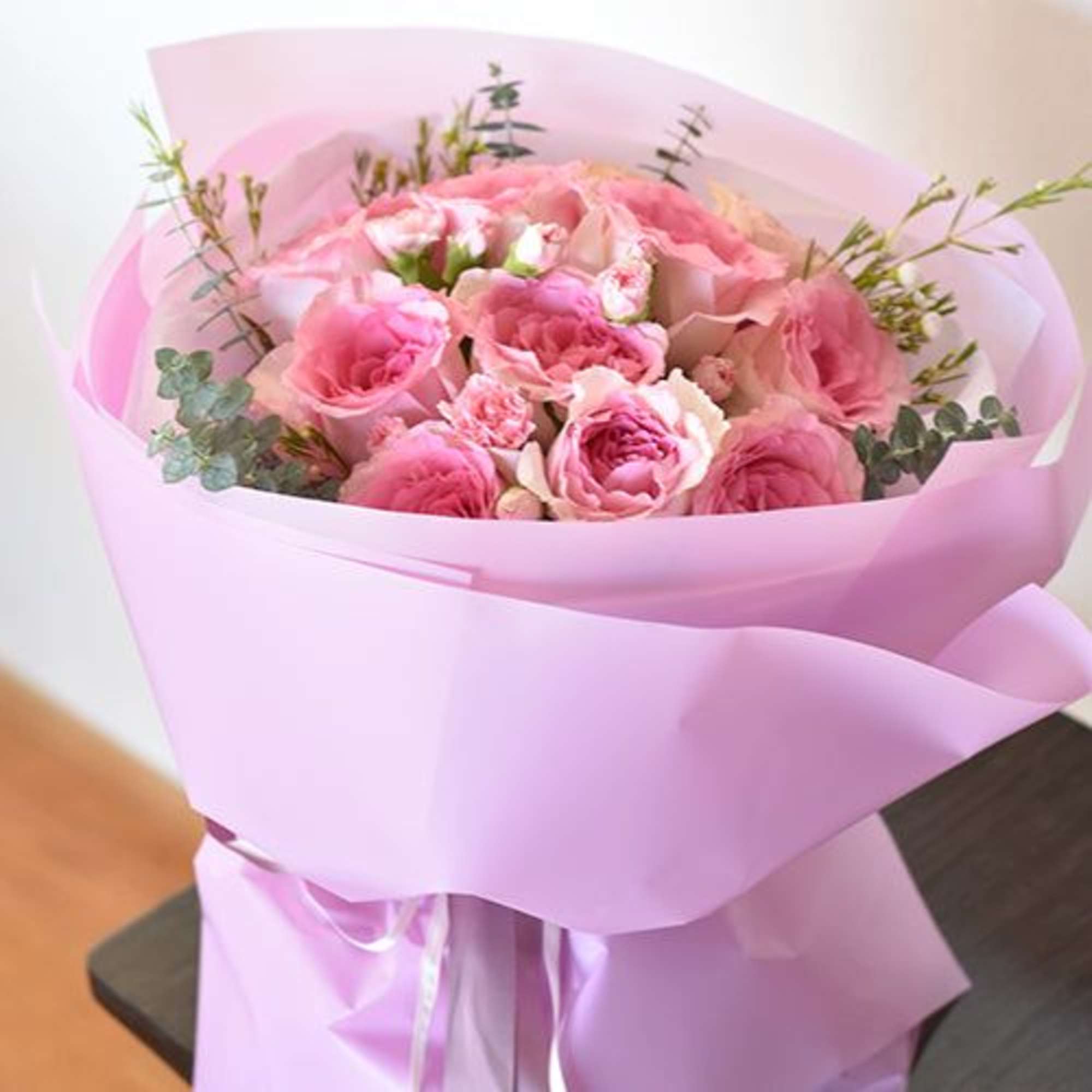 Imagine a bouquet that embodies the essence of romance and grace&mdash;a dozen