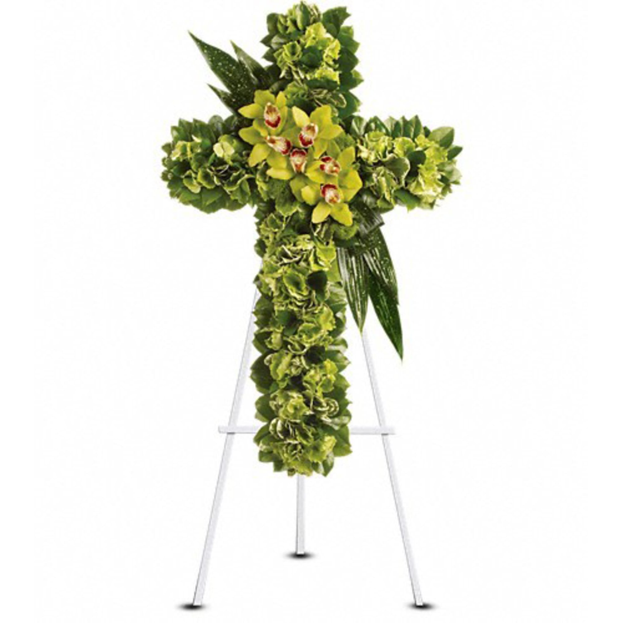 Green floral cross on a white easel stand
