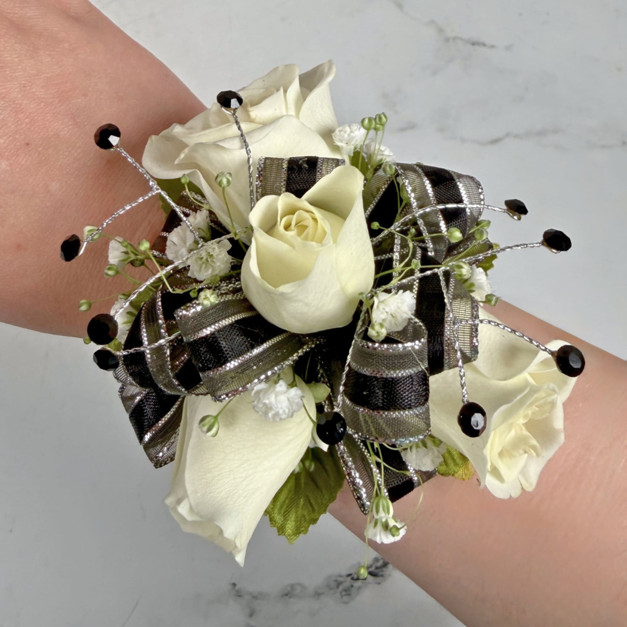 Petite cream-white spray roses contrasted with black and silver shimmering ribbon make, photo 4 of 4