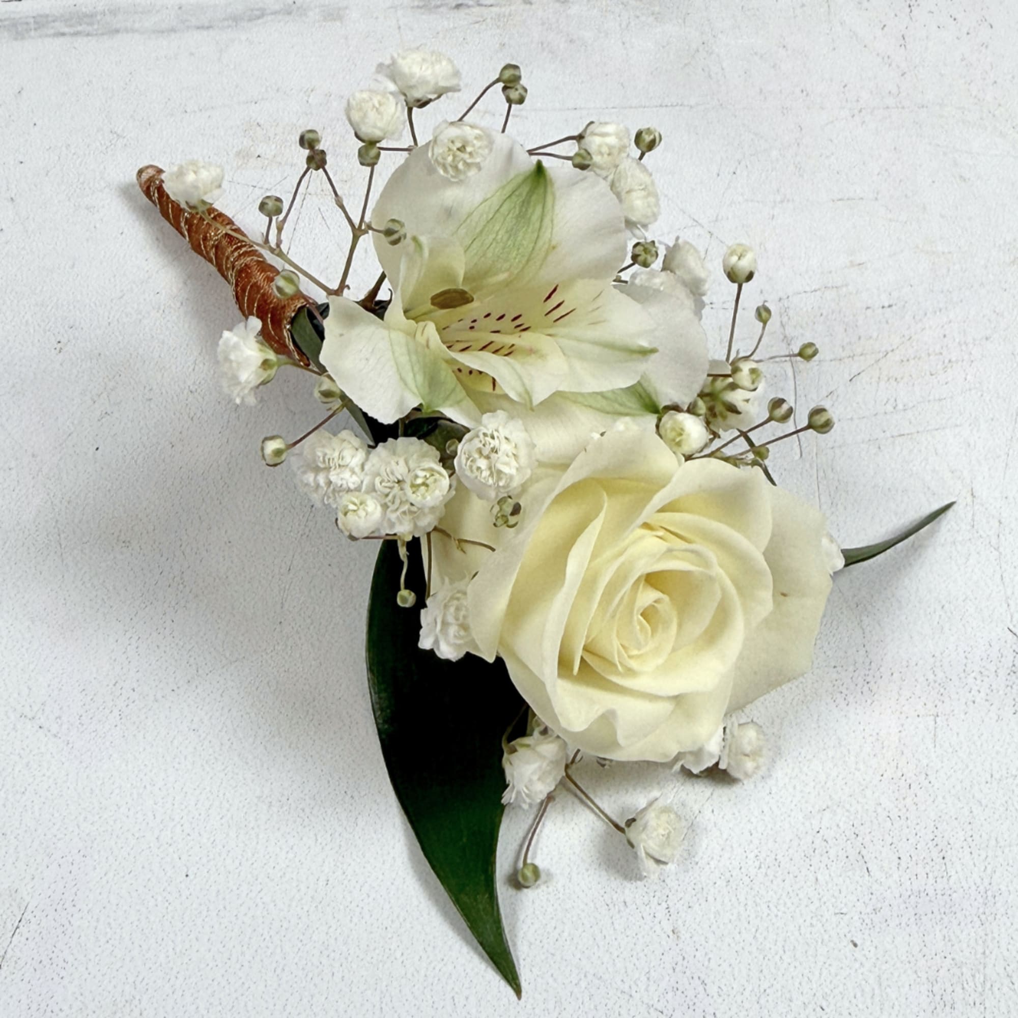 Our Elegant Ivory Boutonniere puts a subtle, but exciting spin on the, photo 2 of 3