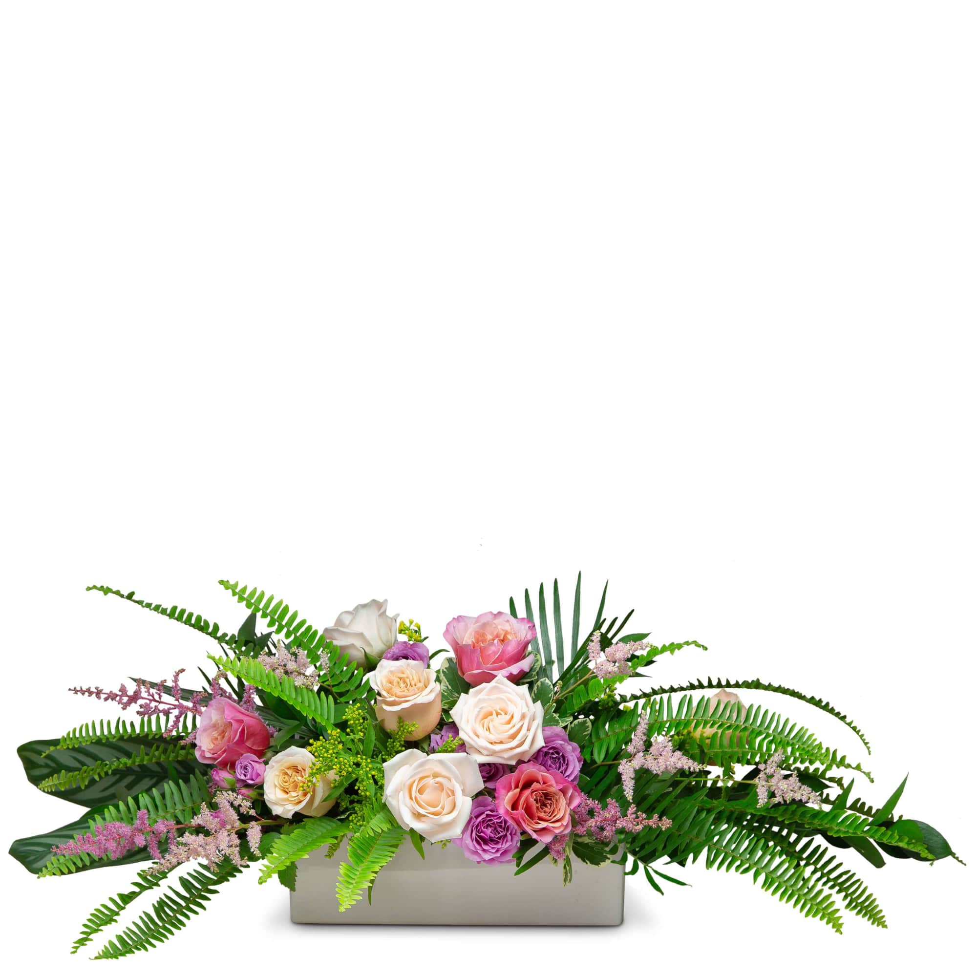 An elegant Easter centerpiece featuring seasonal Florida foliage like calathea, ruscus, sword