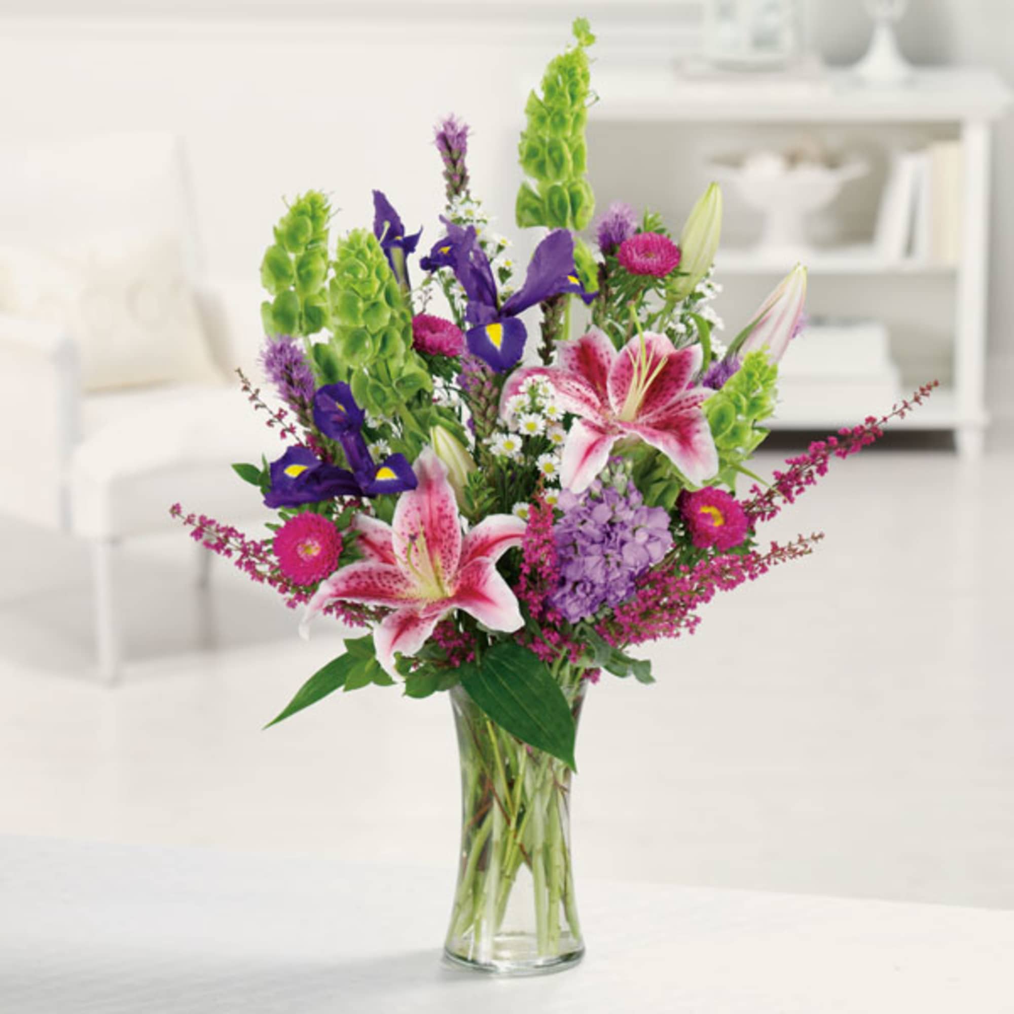 Our freshest collection of 'Stargazer' lilies, bells of Ireland, irises and more.