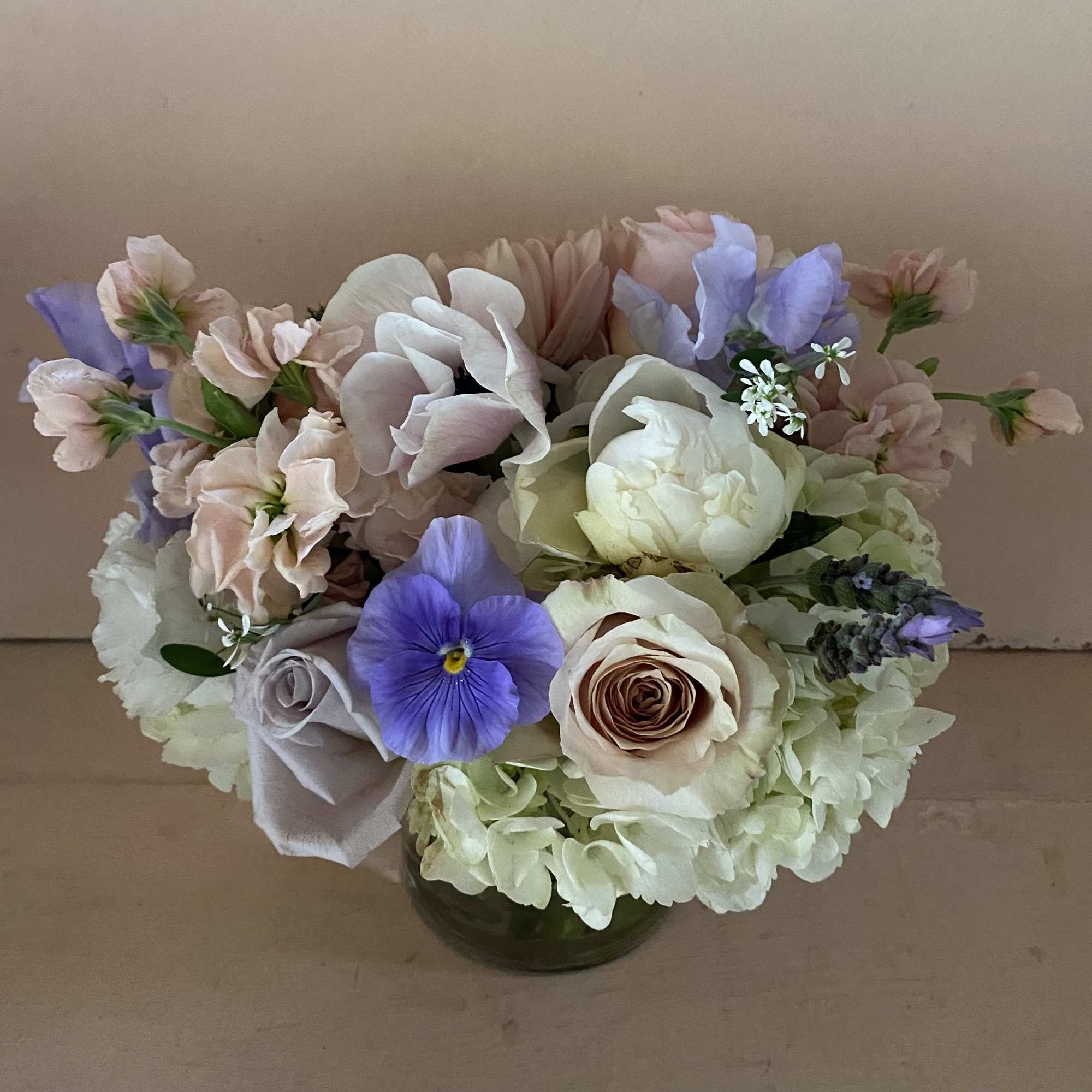 A gorgeous sentiment arrangement in a small 4 by 4" cylinder vase., photo 2 of 3