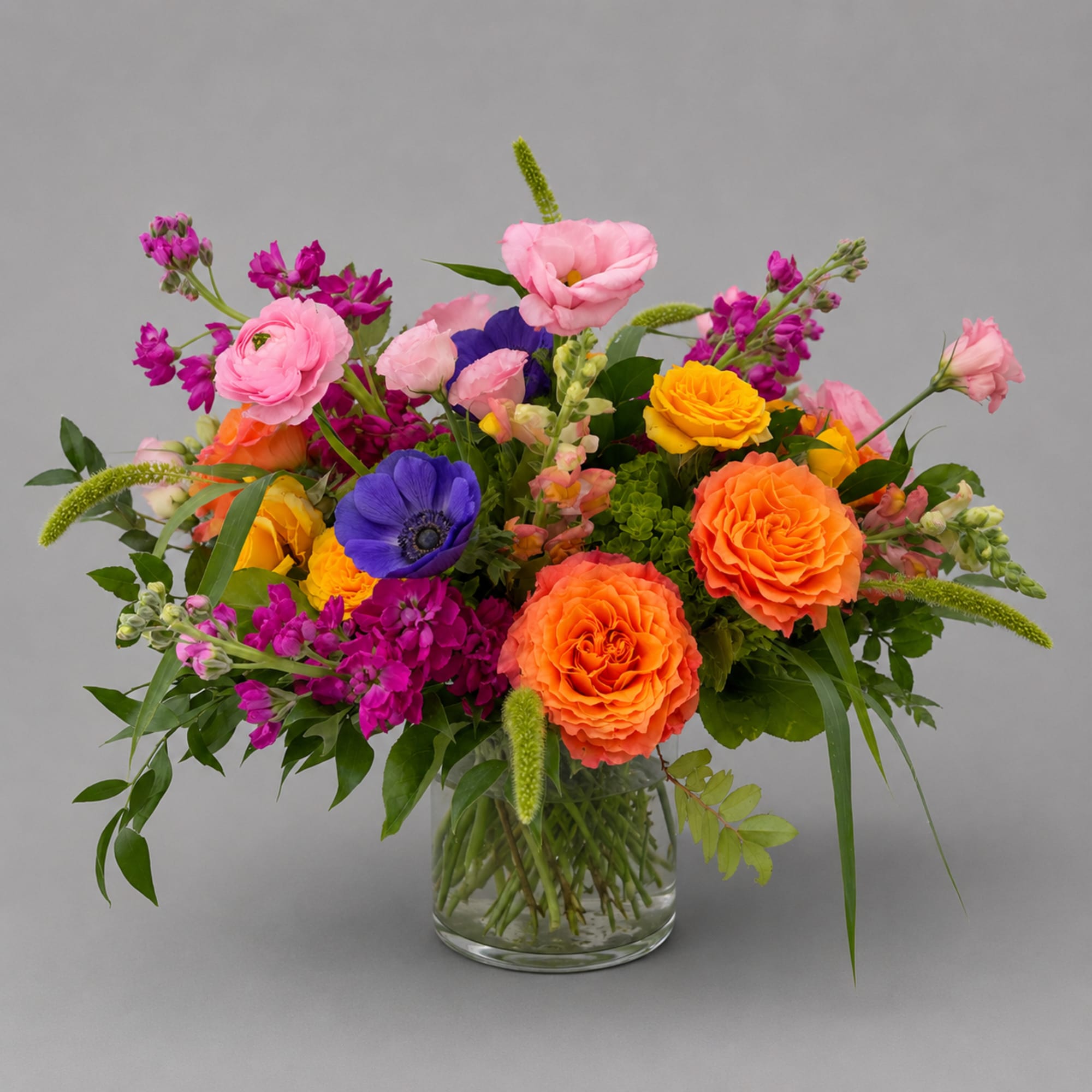 Colorful mixed bouquet in a clear glass vase