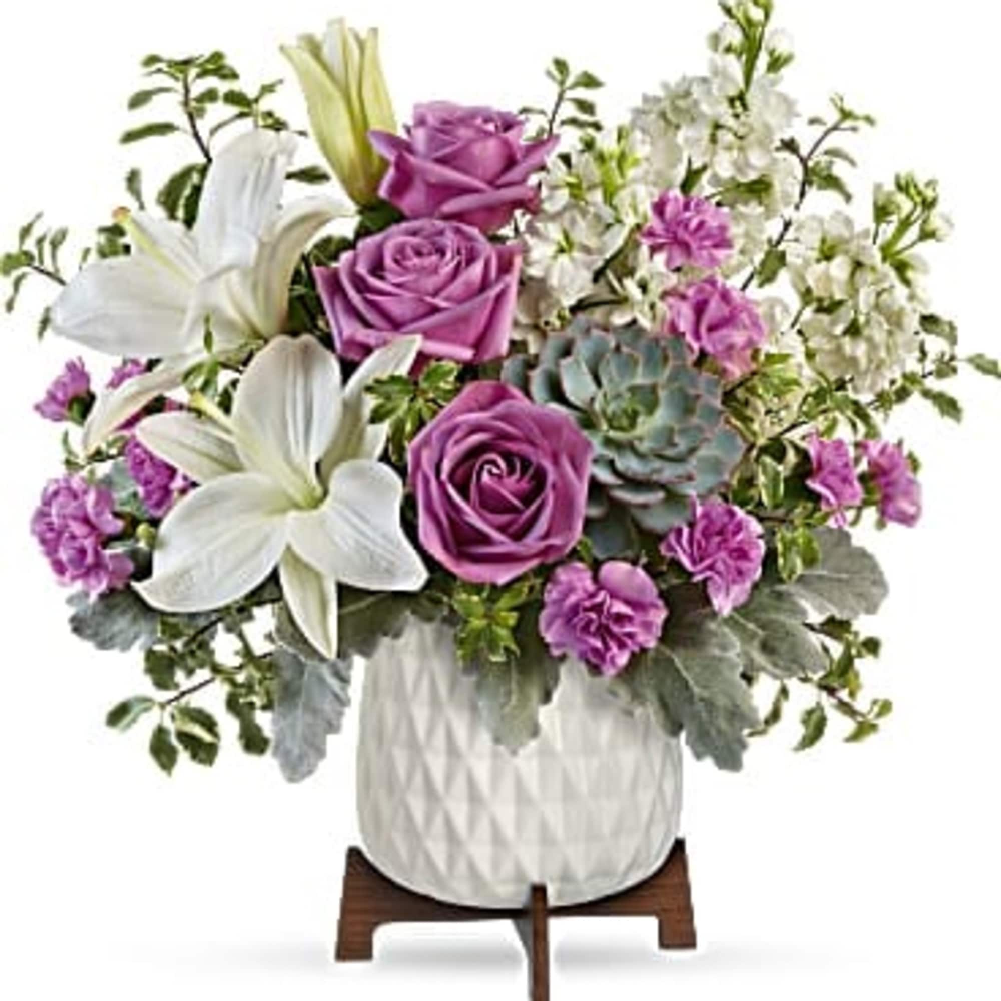 Straight out of a mid-century design magazine, this chic planter is the