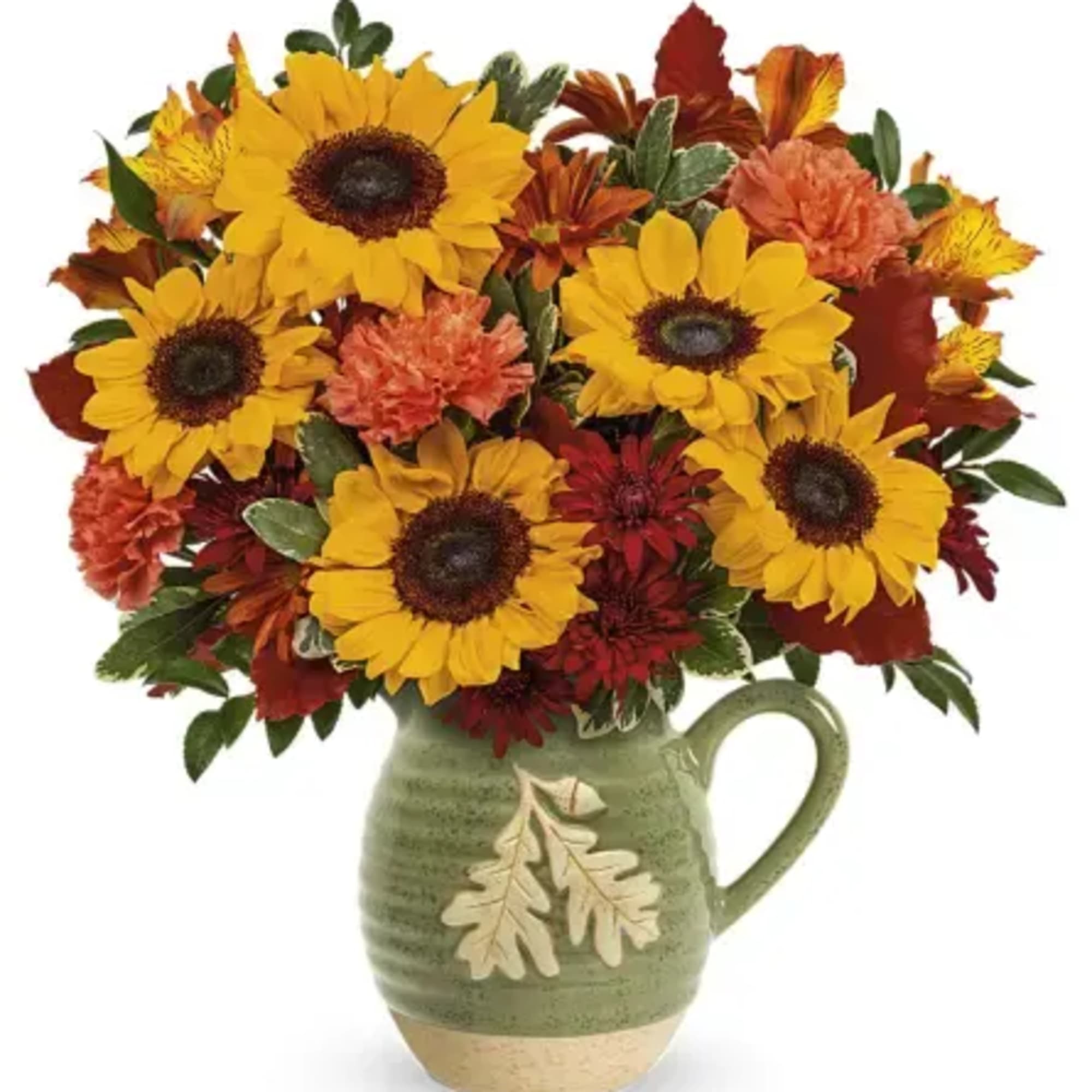 Sunflower and autumn flower arrangement in a ceramic pitcher vase