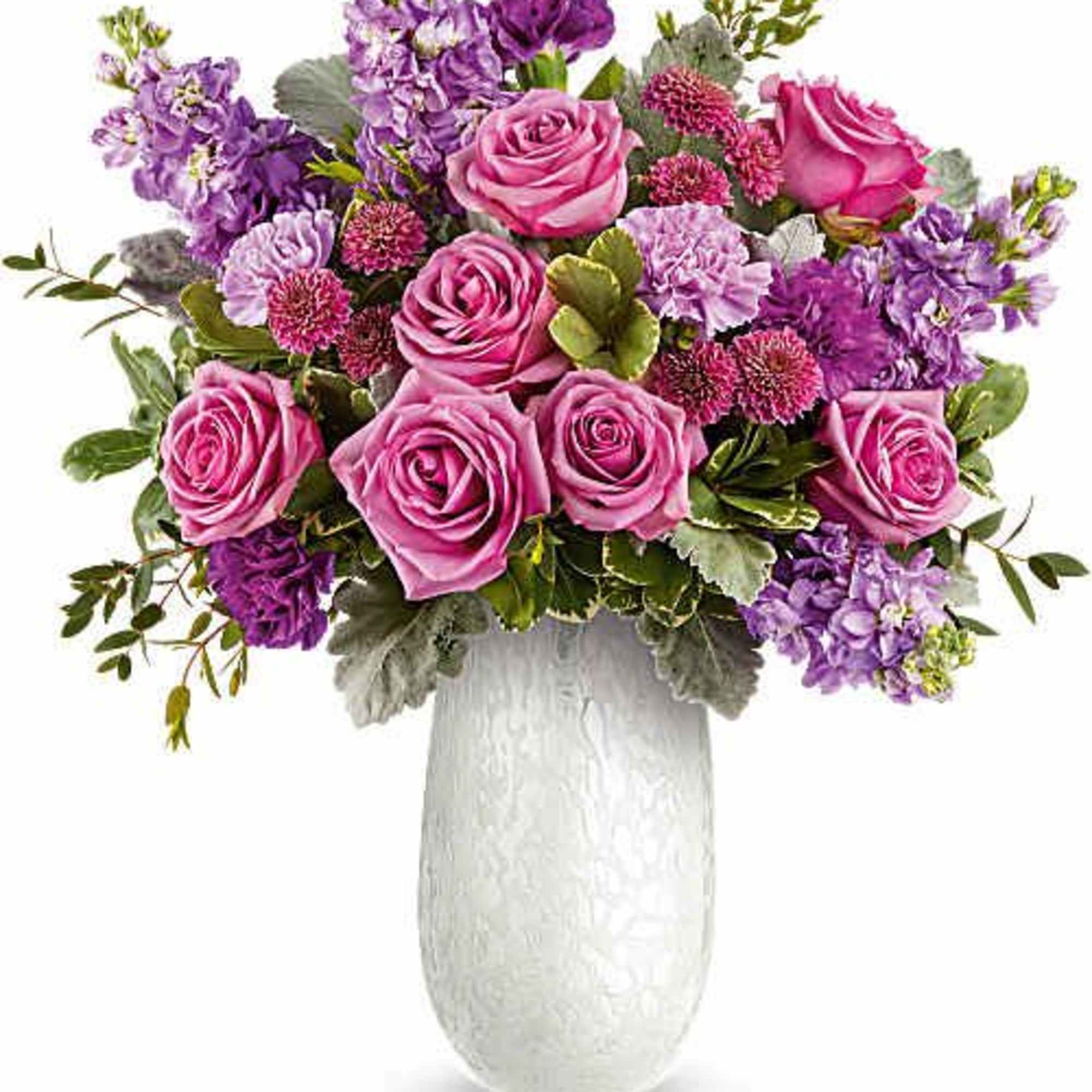 Pink and purple flower arrangement in a white vase