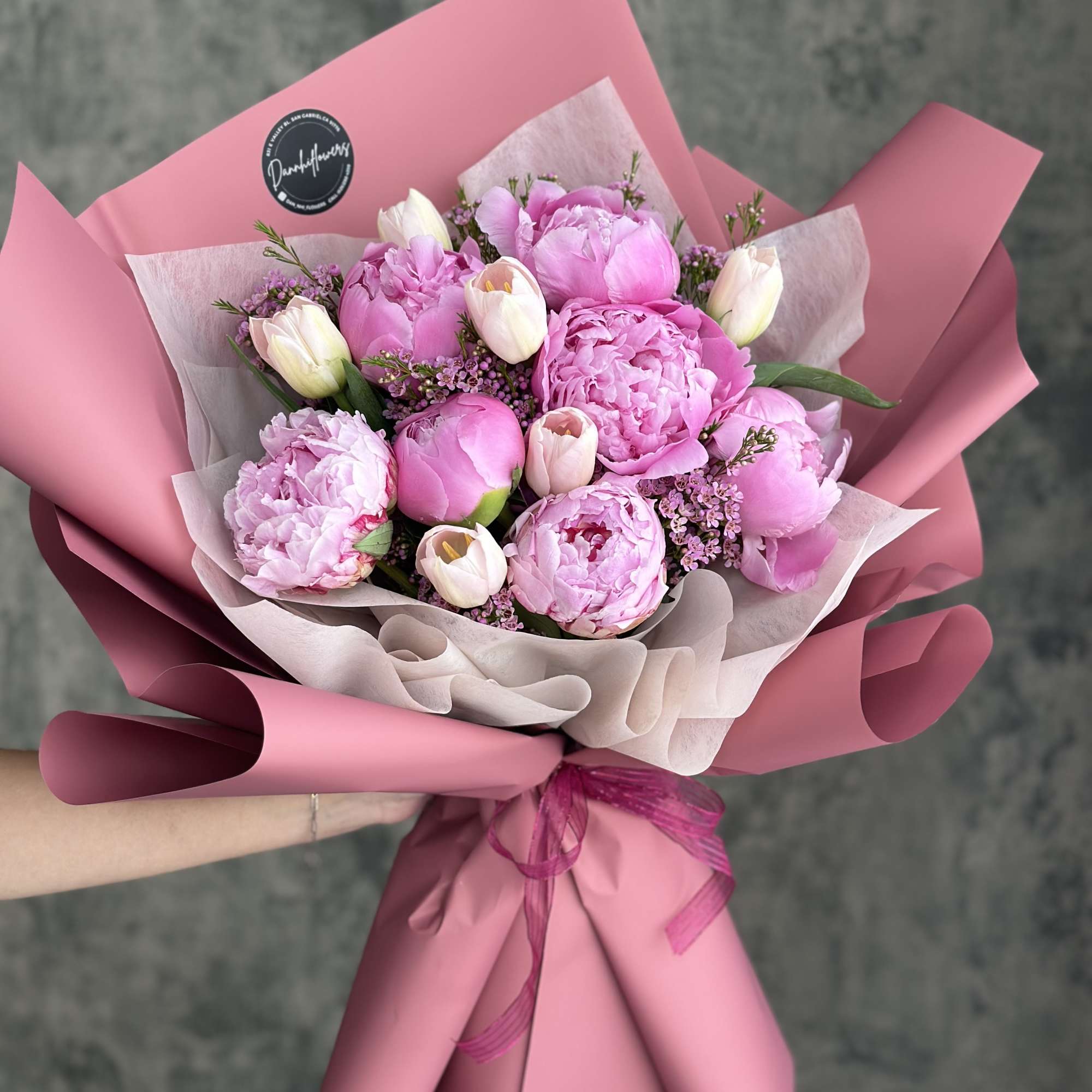 This elegant bouquet features a stunning combination of soft pink peonies and, photo 2 of 3