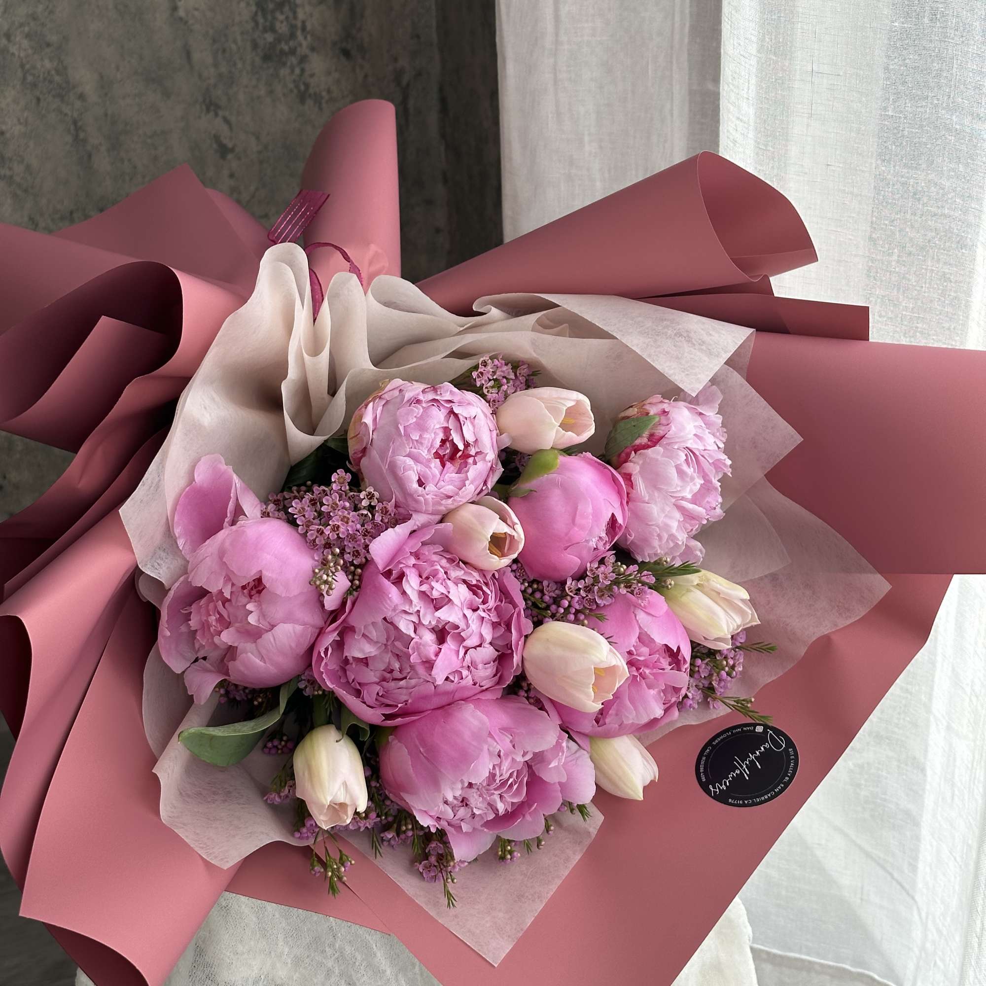 This elegant bouquet features a stunning combination of soft pink peonies and, photo 3 of 3