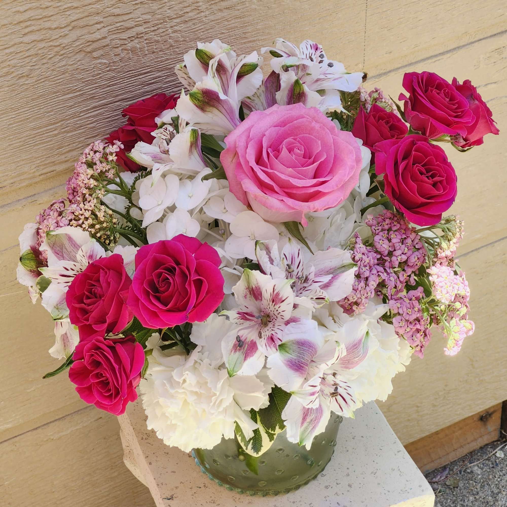 This ready to go in cooler arrangement for a last minute flower