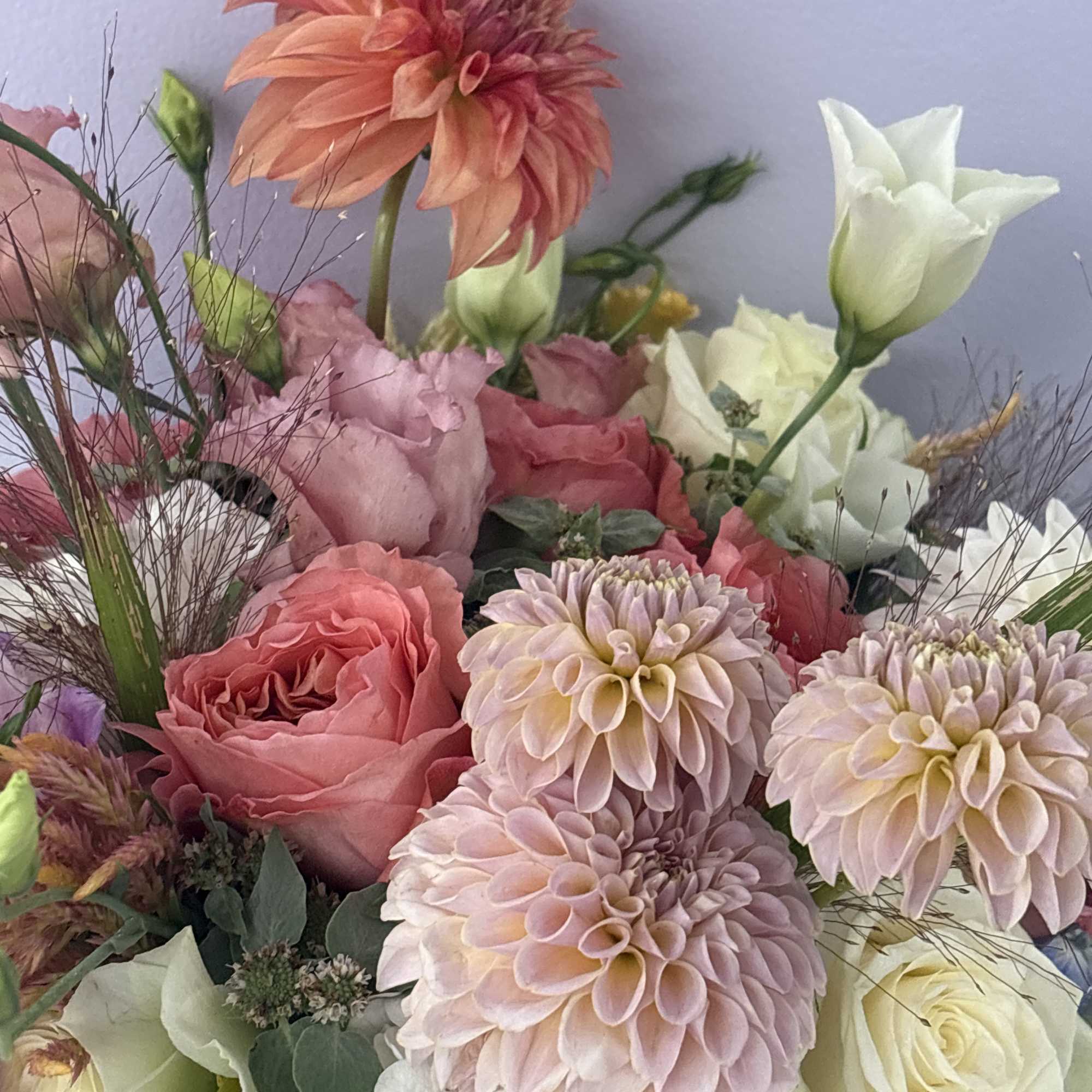 Bouquet of pink and white flowers with a peach bloom
