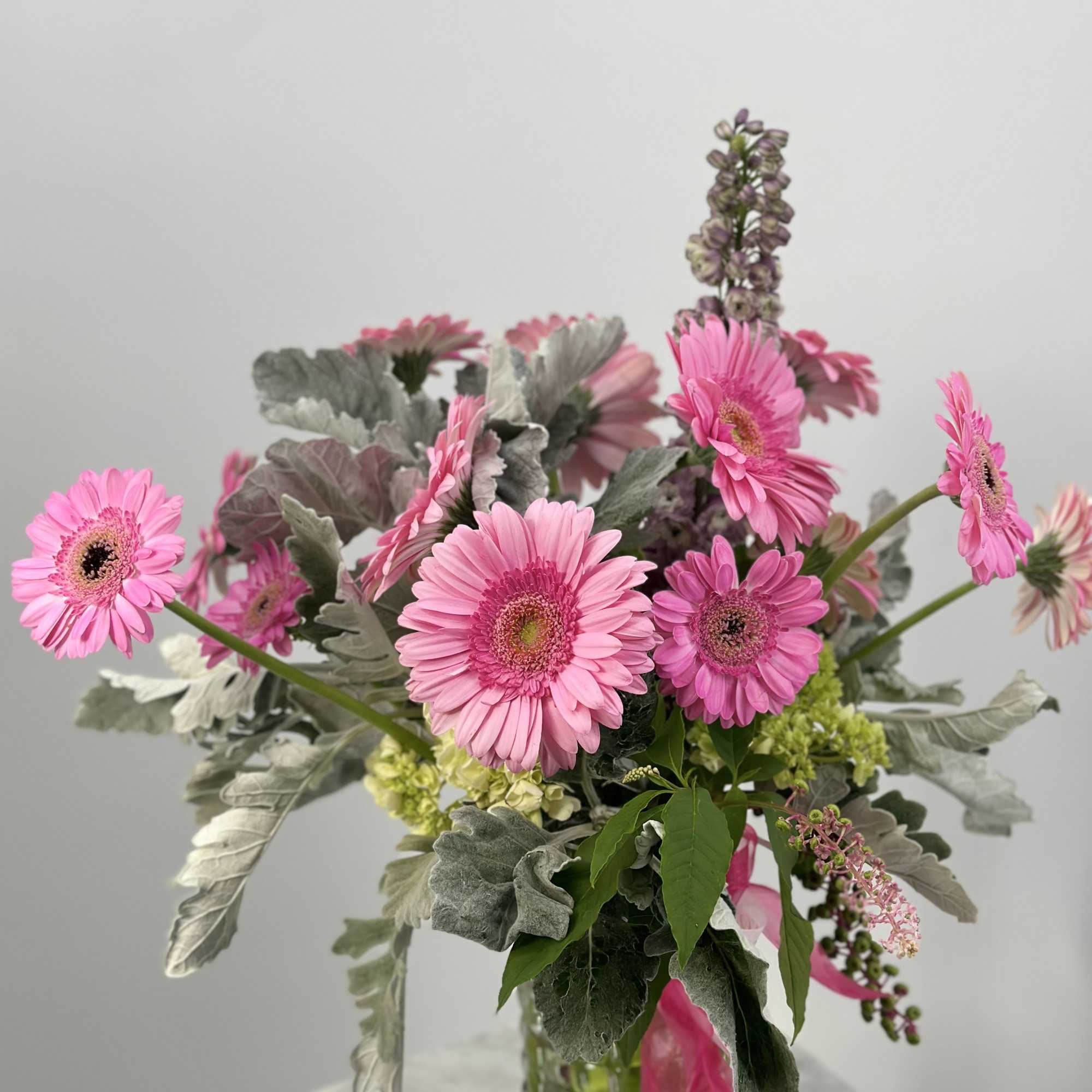 This tall standing arrangement is a little bit sassy, a little bit, photo 2 of 4