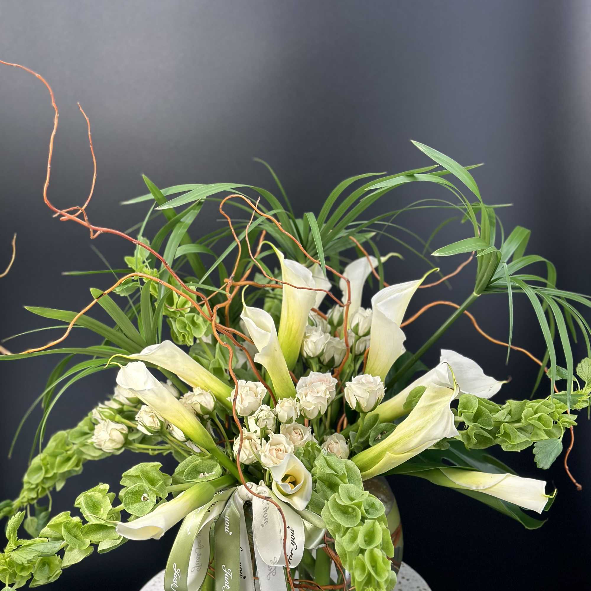 A very elegance ,luxurious fresh white calla lilies and rich seasonal greens, photo 4 of 4
