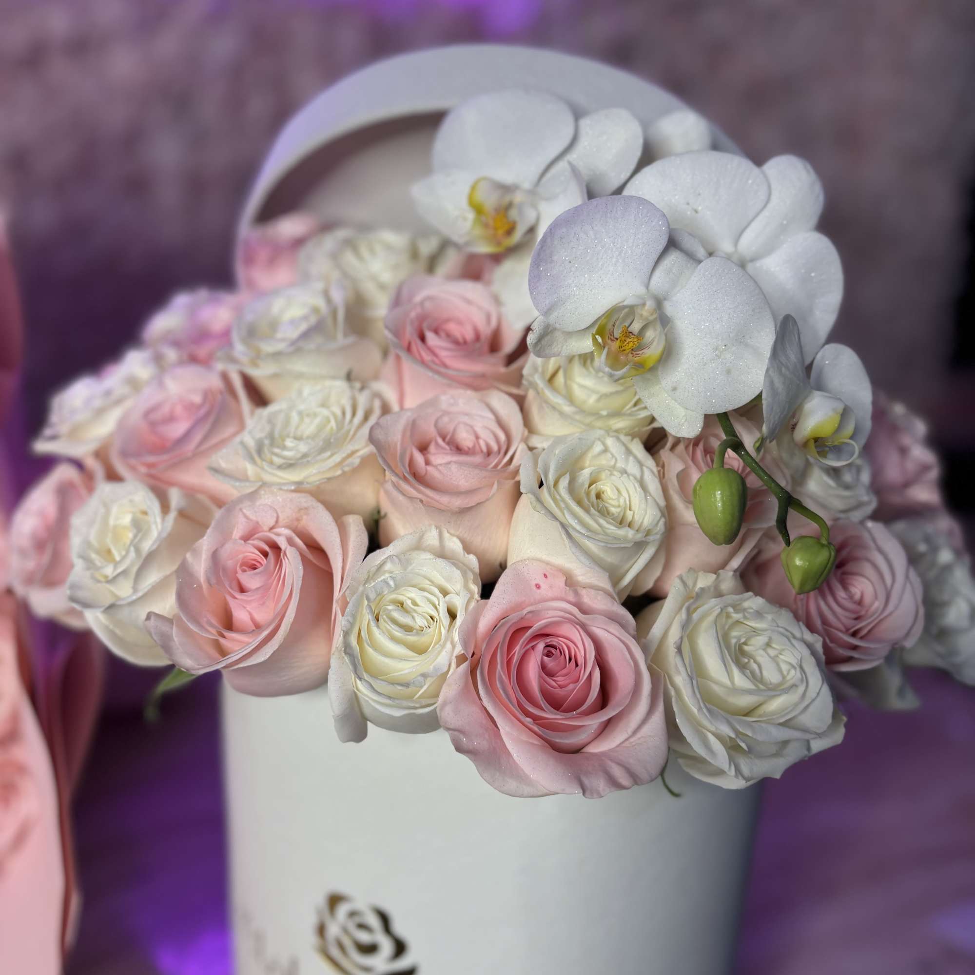 A timeless arrangement featuring 36 fresh pink and white roses complemented by, photo 3 of 3