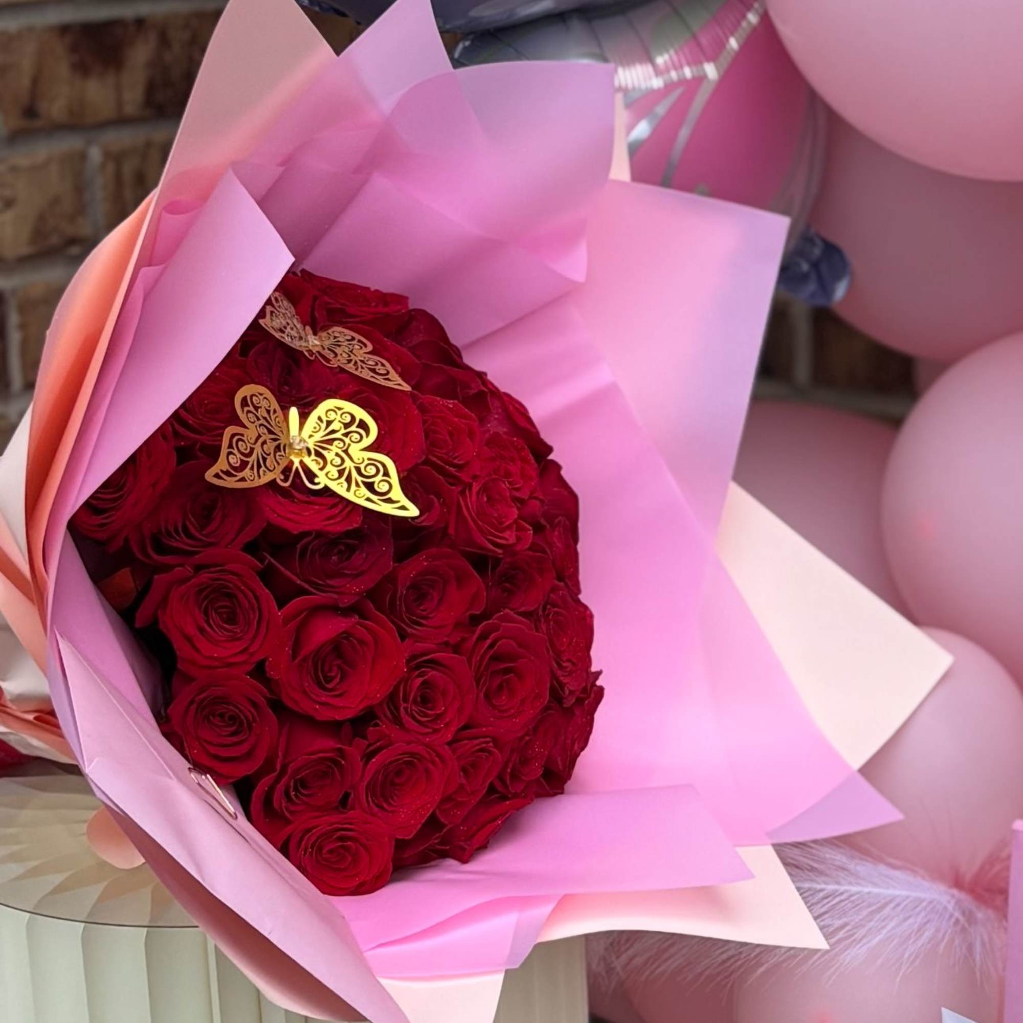 Red roses wrapped in pink wrapping paper

 Handcrafted with love by P&eacute;tale, photo 2 of 3