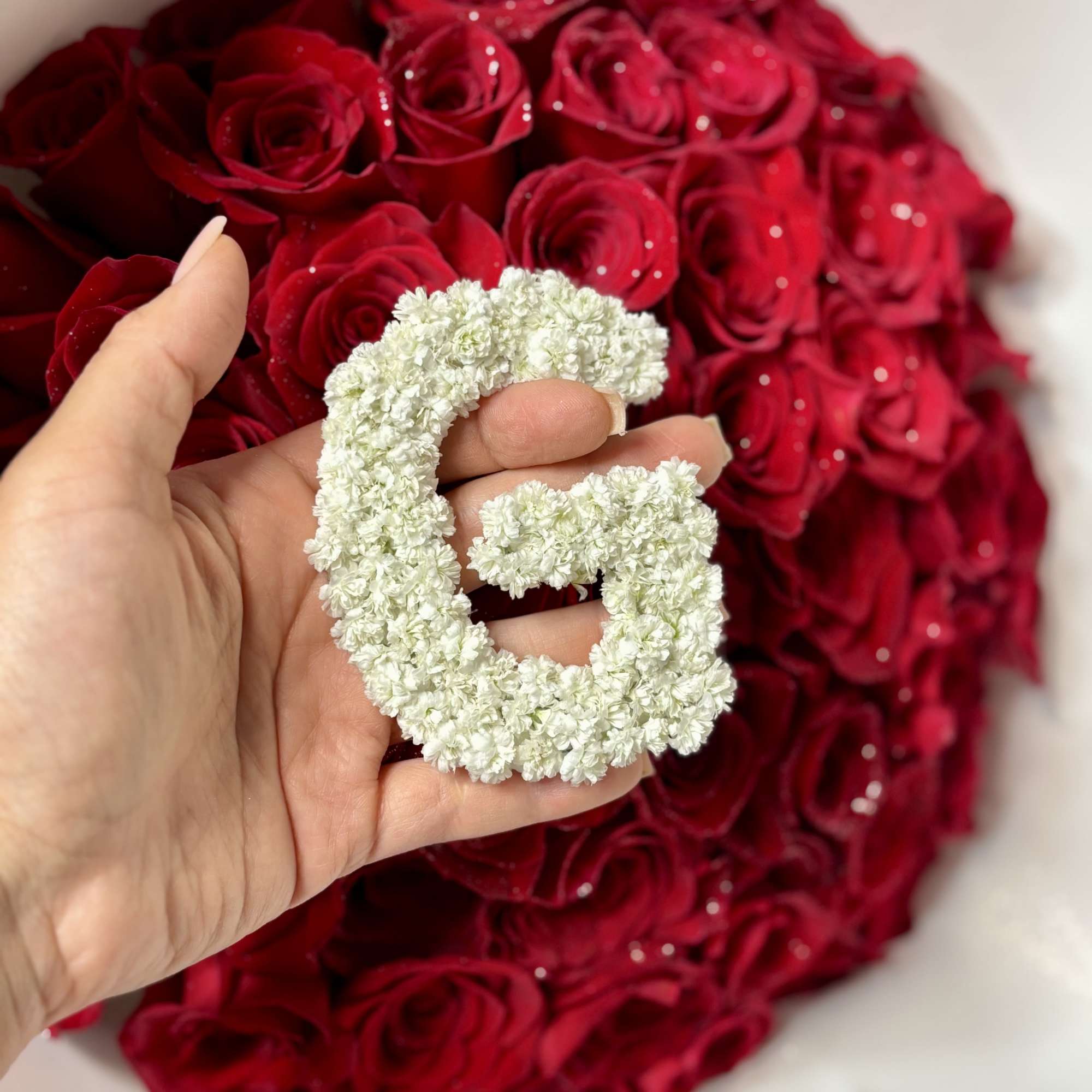 A luxurious statement bouquet featuring premium red roses beautifully wrapped in our, photo 2 of 4