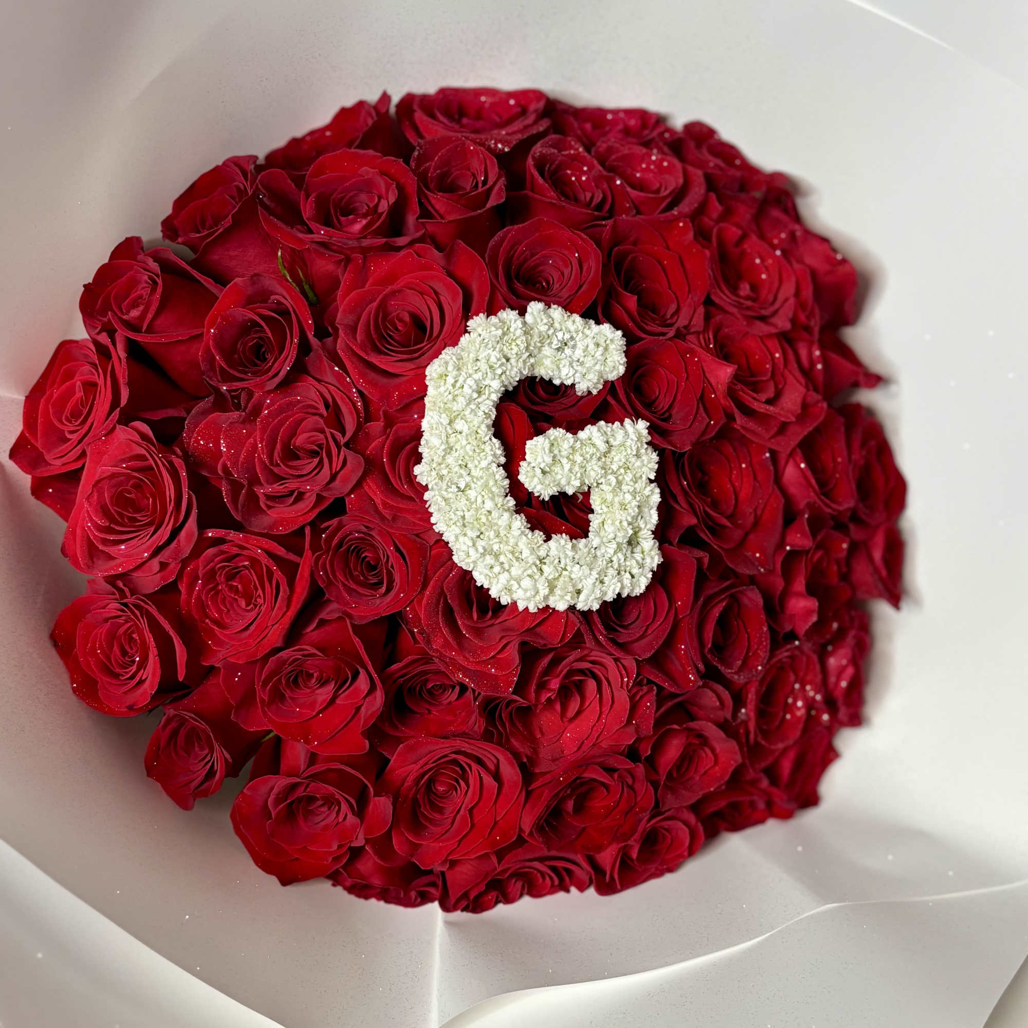 A luxurious statement bouquet featuring premium red roses beautifully wrapped in our, photo 4 of 4