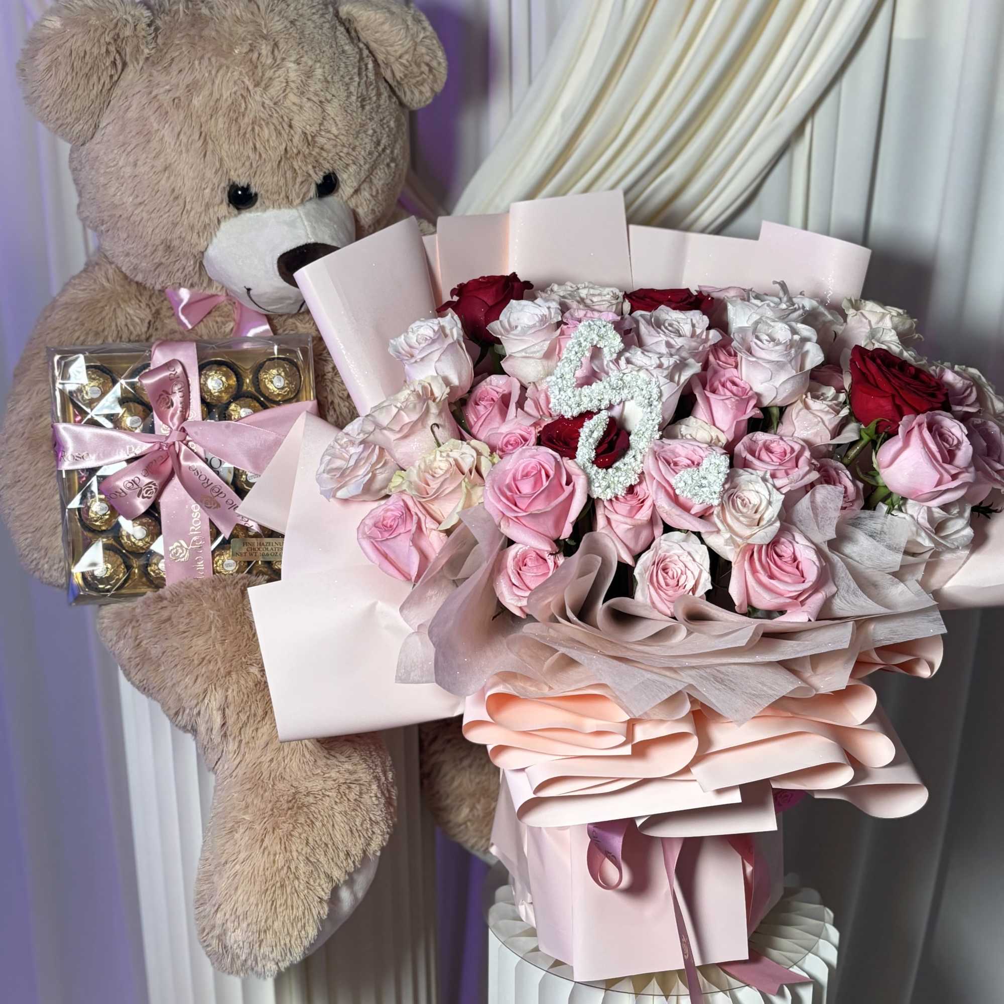 A romantic luxury bouquet featuring premium blush, ivory, and soft pink roses, photo 2 of 3