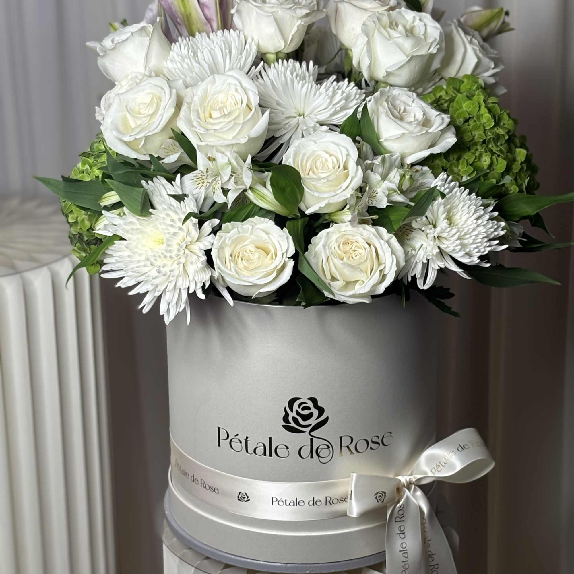 A timeless arrangement designed to bring elegance, peace, and sophistication to any