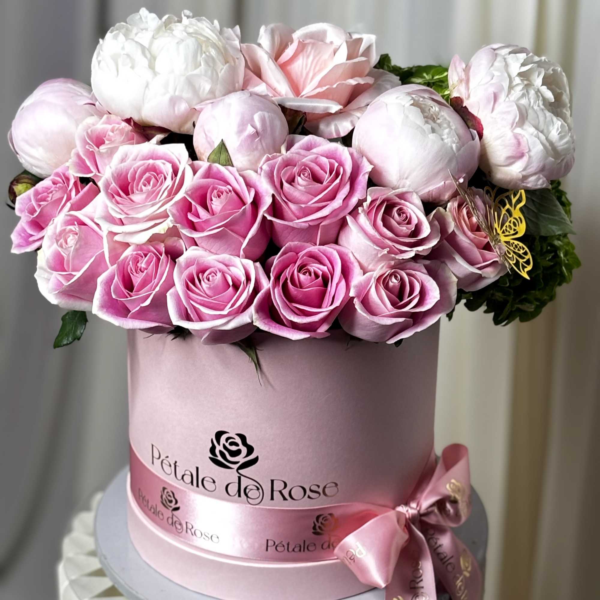A luxurious floral box designed to celebrate Mom in the most elegant