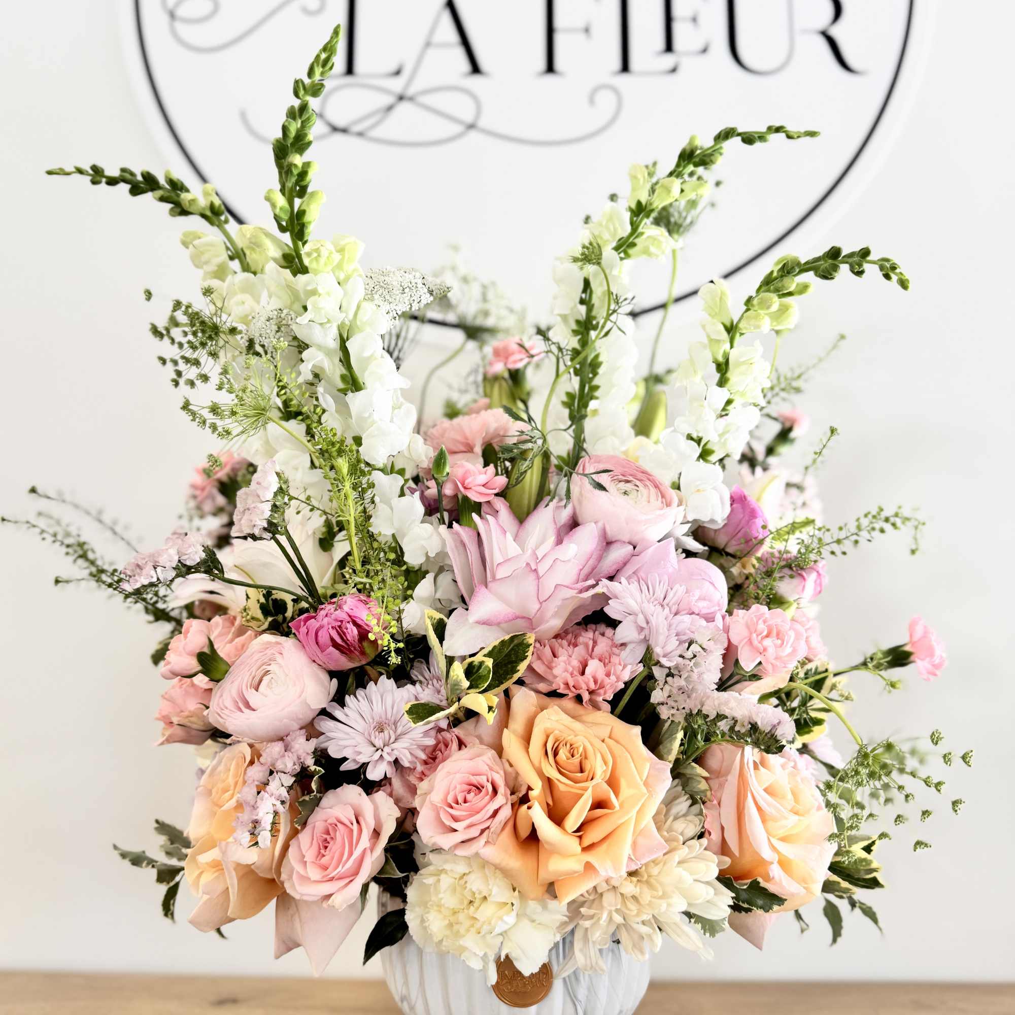 An extraordinary floral statement designed for life's most significant celebrations and accomplishments.