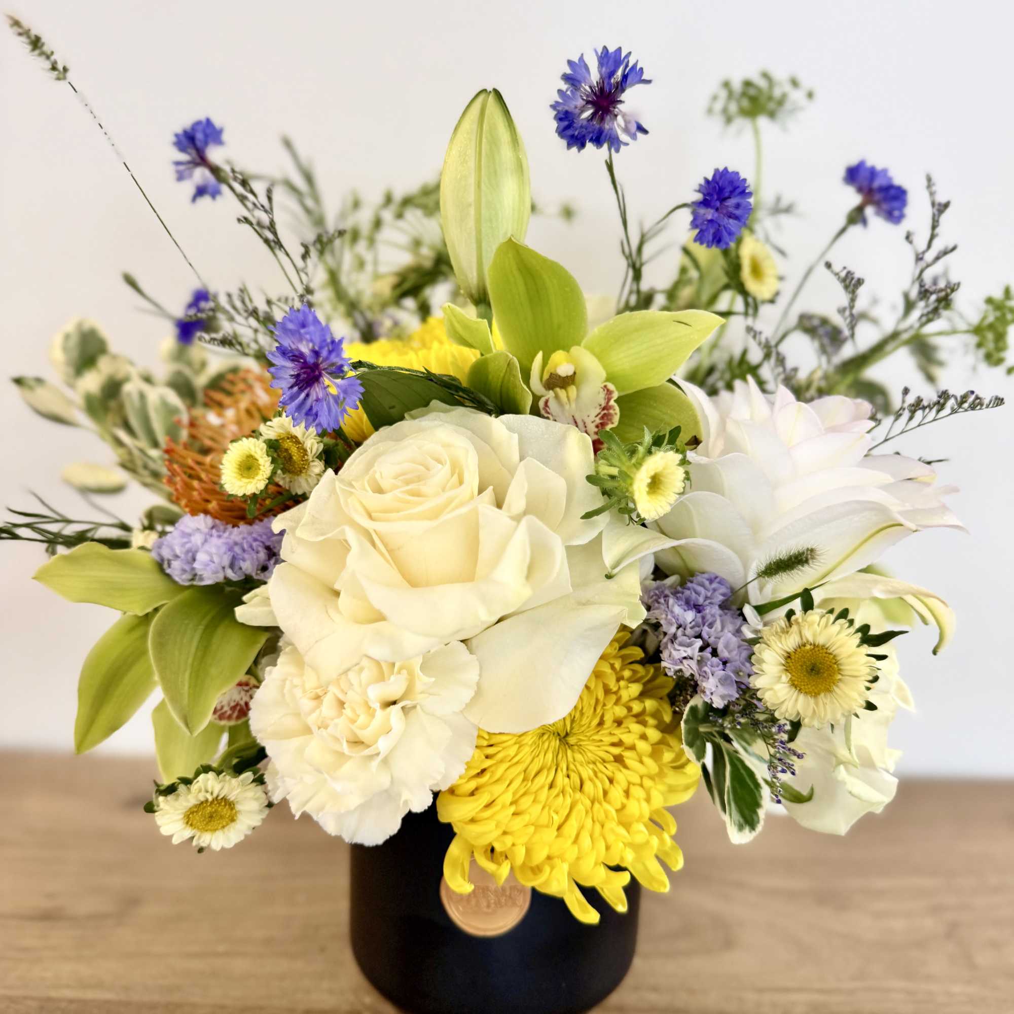 Designed with him in mind, Quiet Confidence is a refined floral composition