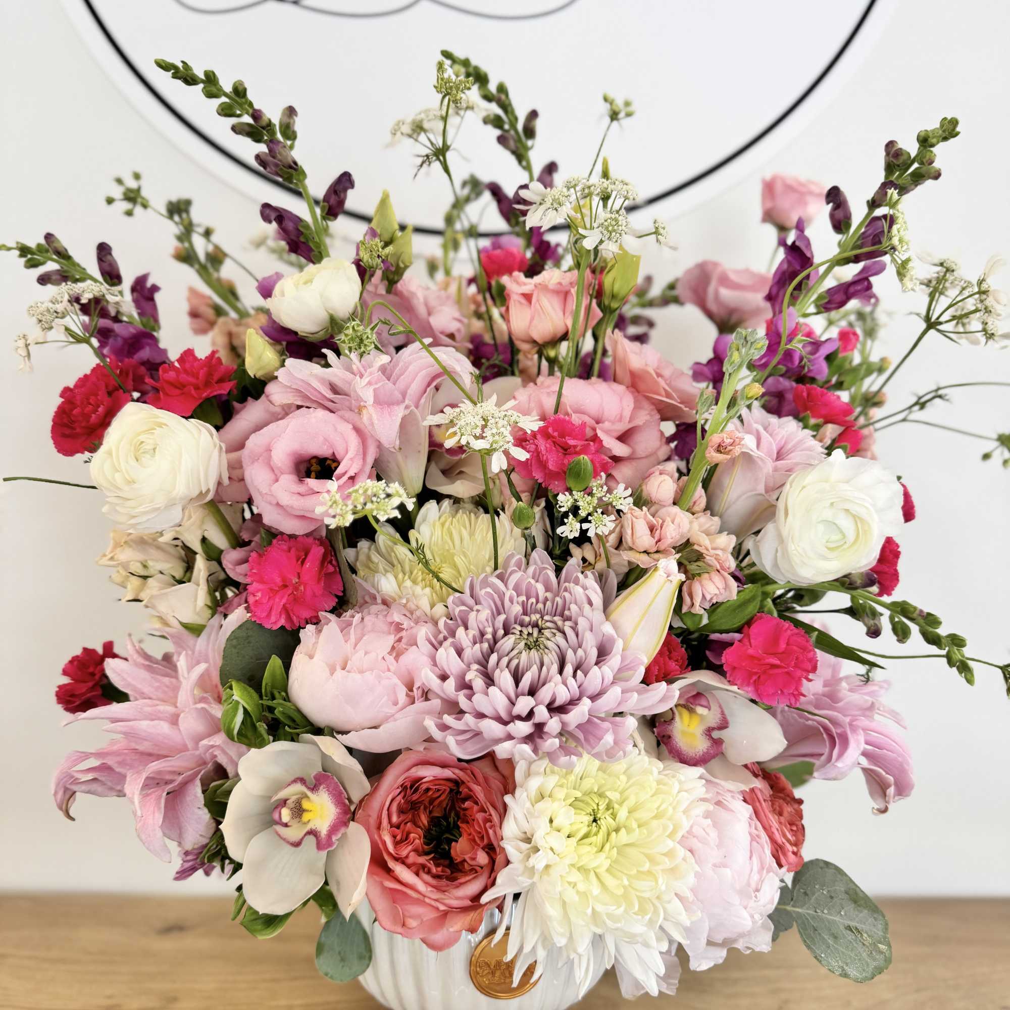 An extraordinary floral statement designed for life's most significant celebrations and accomplishments.