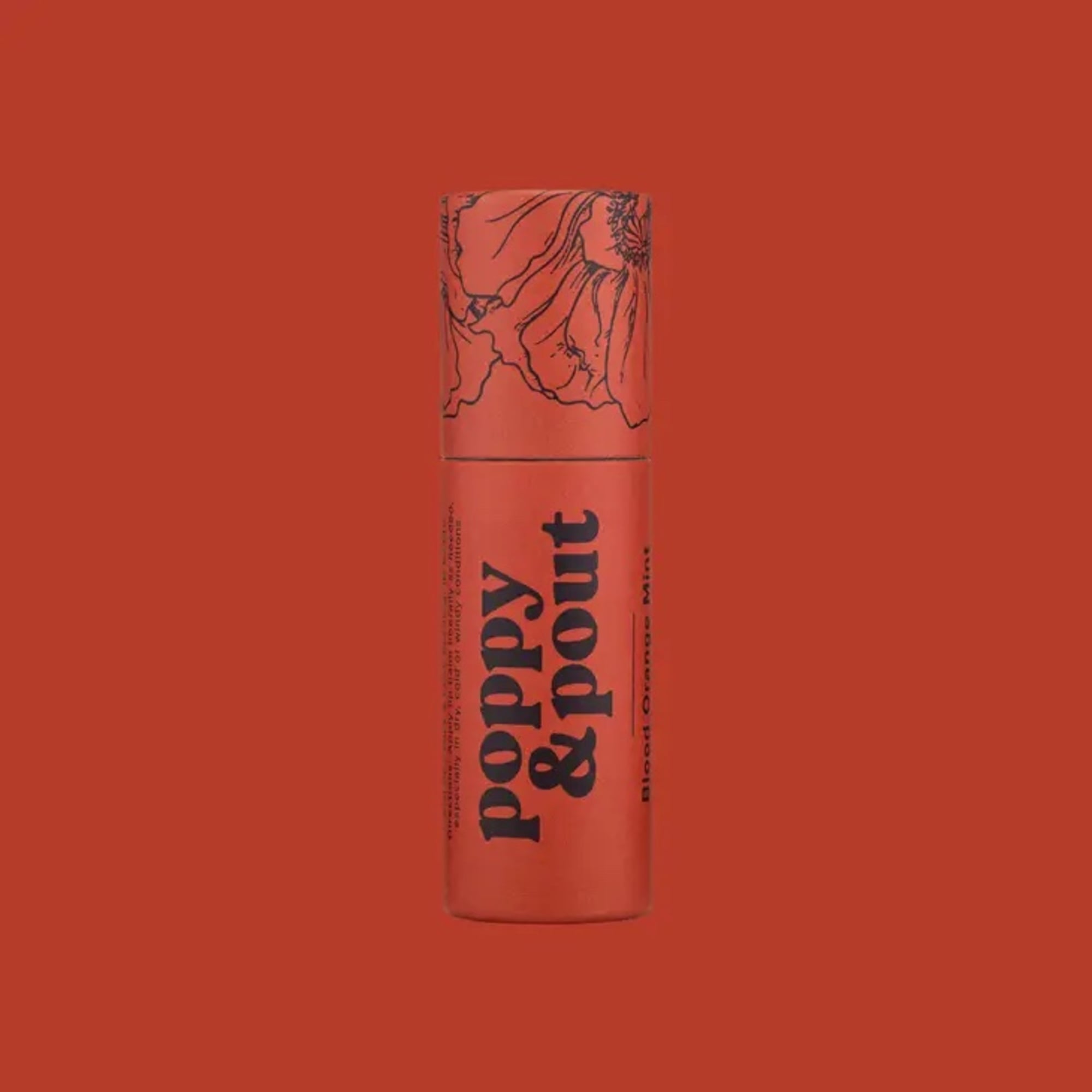 A coral lipstick tube with floral line art and bold text